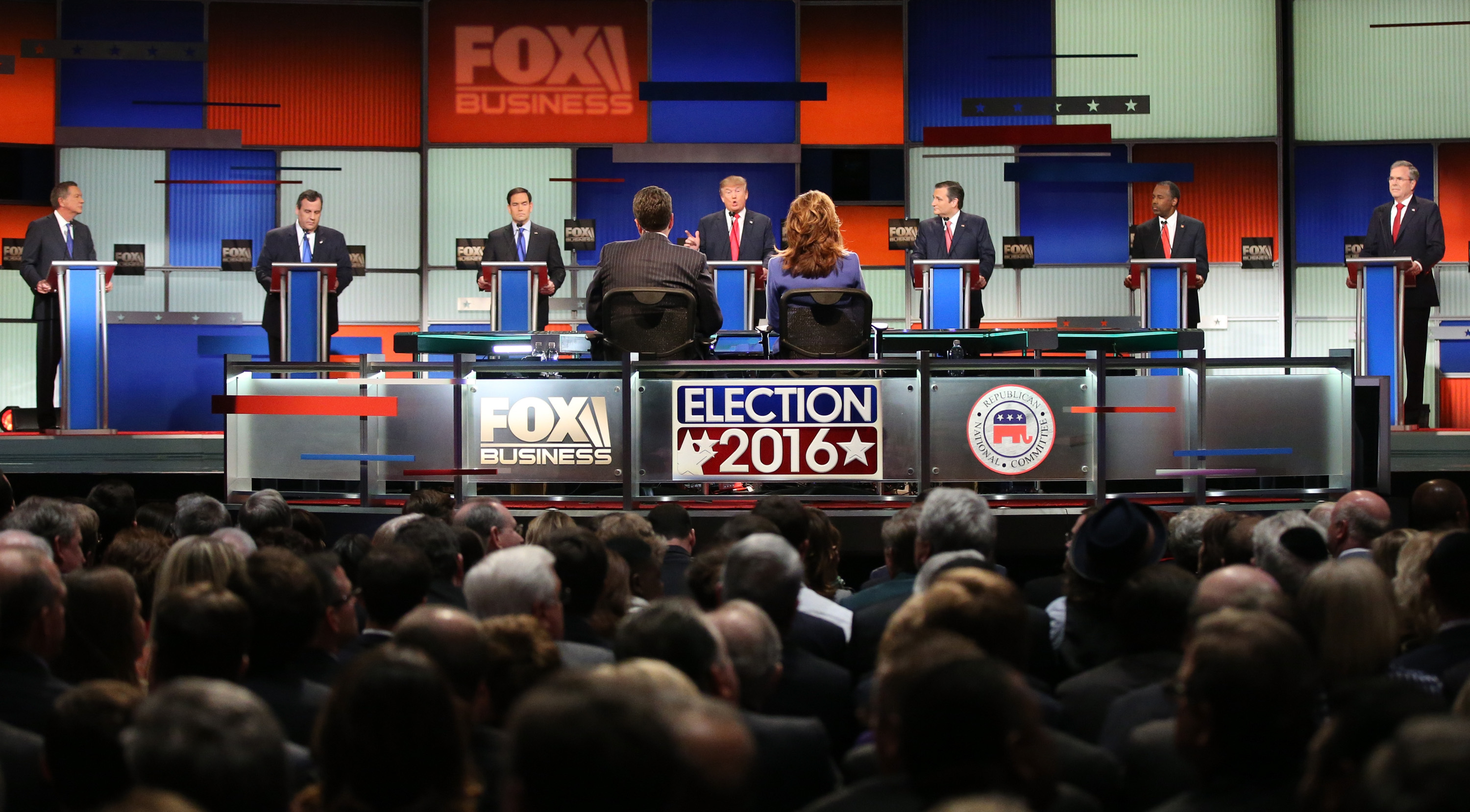 Republican presidential candidates (L-R) Ohio Governor John Kasich, New Jersey Governor Chris Christie, Sen. Marco Rubio (R-FL), Donald Trump, Sen. Ted Cruz (R-TX), Ben Carson and Jeb Bush participate in the Fox Business Network Republican presidential debate at the North Charleston Coliseum and Performing Arts Center on January 14, 2016 in North Charleston, South Carolina. The sixth Republican debate is held in two parts, one main debate for the top seven candidates, and another for three other candidates lower in the current polls. (Scott Olson—Getty Images)