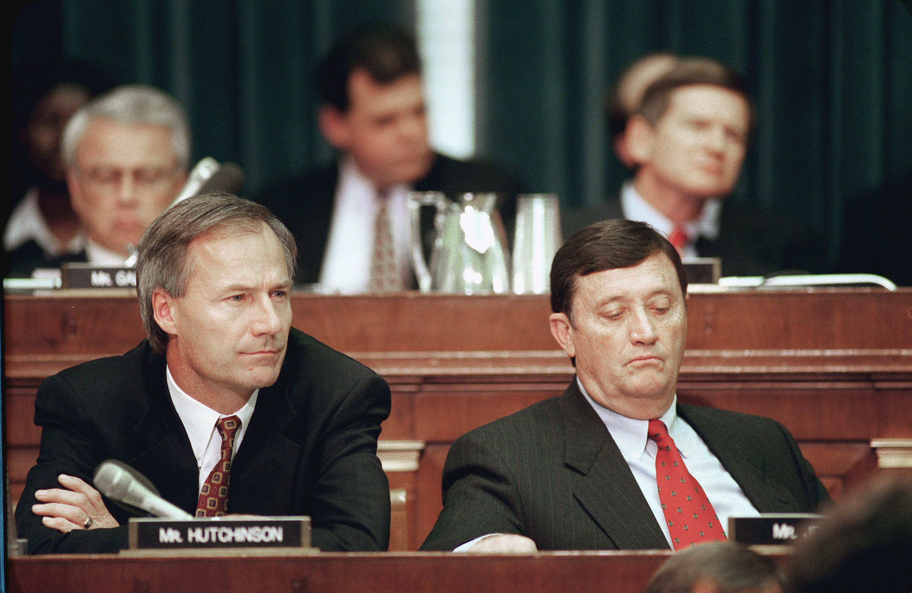 Asa Hutchinson,R-Ark., and Bill Jenkins,R-Tenn.,listen to Independent Counsel Kenneth Starr opening statement before the House Judiciary Committee regarding articles of impeachment against President Bill Clinton.  ( Scott J. Ferrell--Congressional Quarterly/Getty Images) (Scott J. Ferrell—CQ-Roll Call,Inc.)