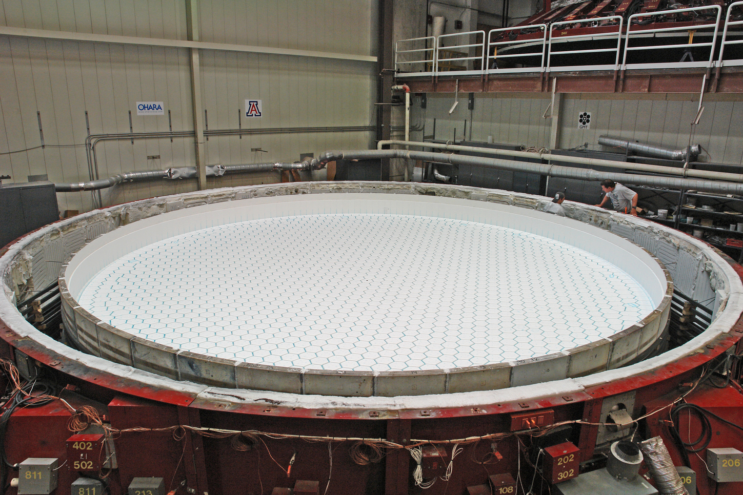 Mold for casting an 8.4-meter honeycomb mirror for the GMT. The glass will melt around the hexagonal boxes to form the honeycomb. (Ray Bertram—Steward Observatory)