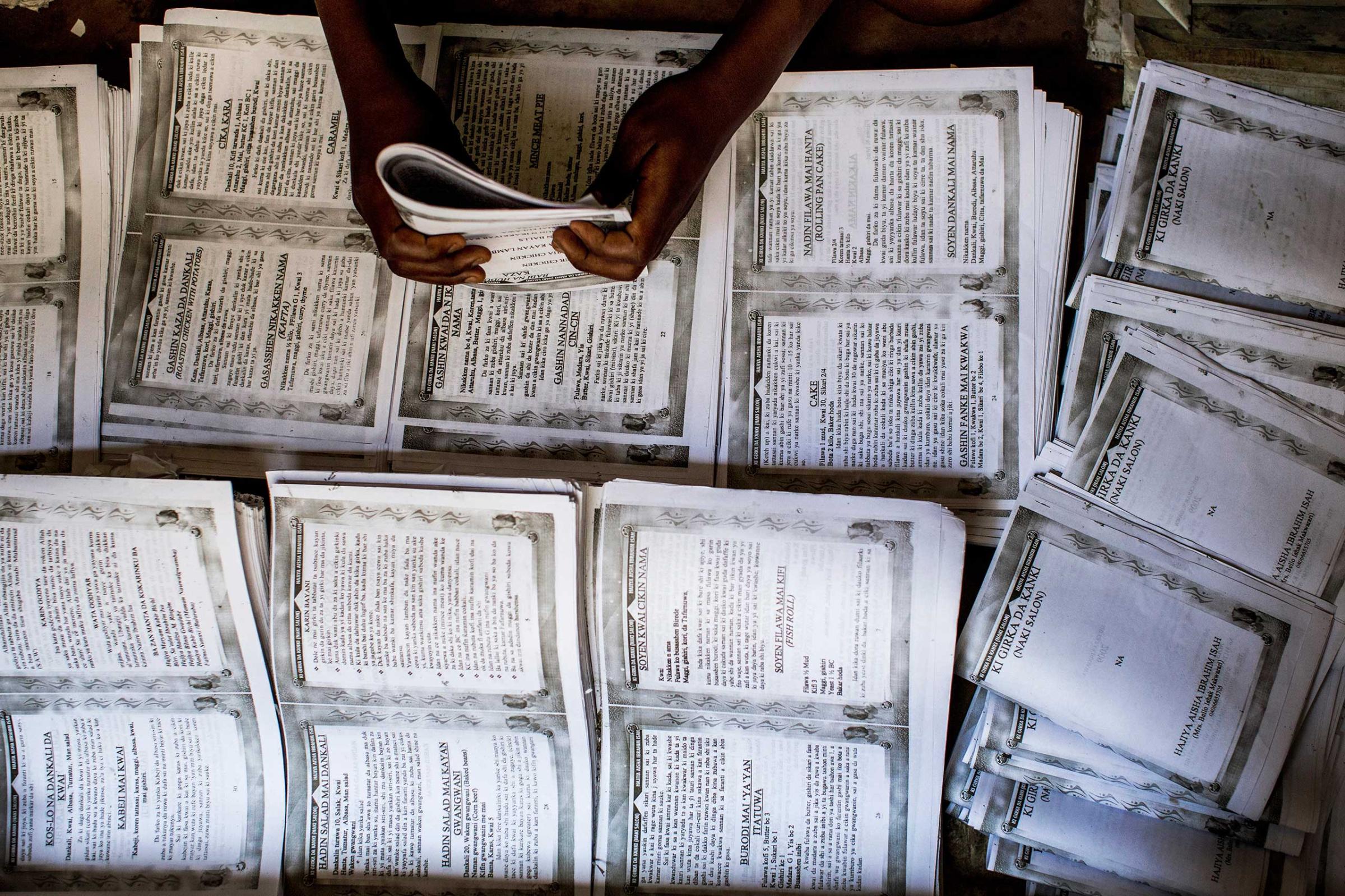 Novels and other books are put together by hand in Kano, Northern Nigeria, April 8, 2013.