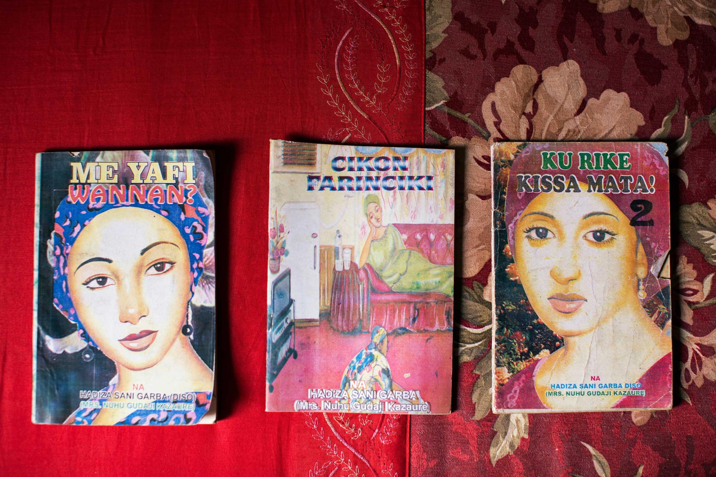 Three novels with hand drawn covers by Hadiza Garba, a popular novelist, Kano, Northern Nigeria, April 10, 2013.