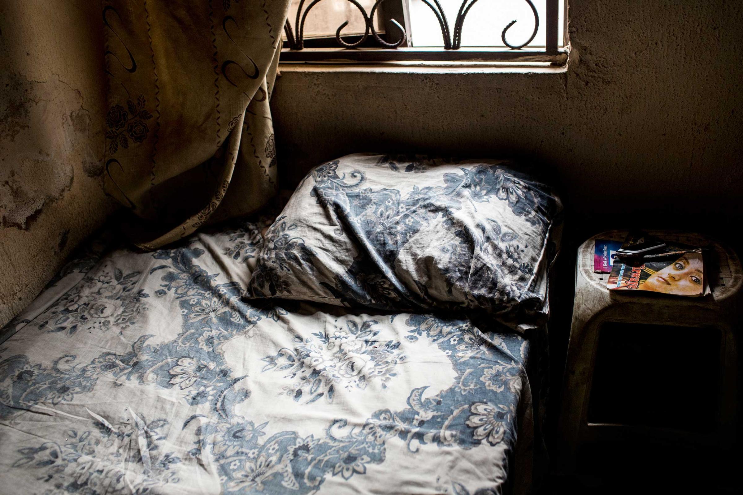 A novel sits on the bedside table of a young girl in Kano, Northern Nigeria, March 1, 2014.