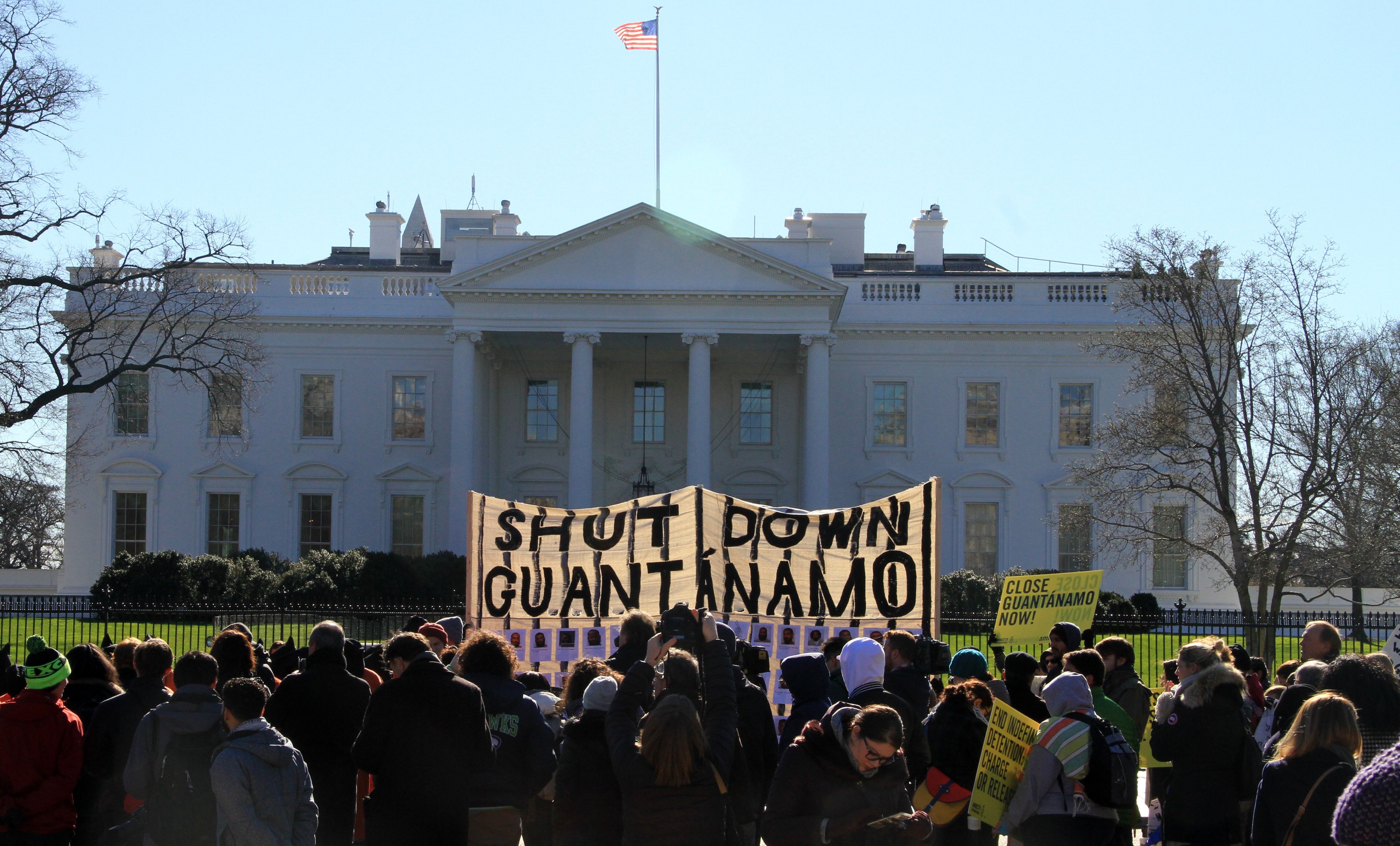 Protesters hold banners during a protest in front of the White House in Washington D.C. on Jan. 11, 2016. (Erkan Avci—Anadolu Agency/Getty Images)