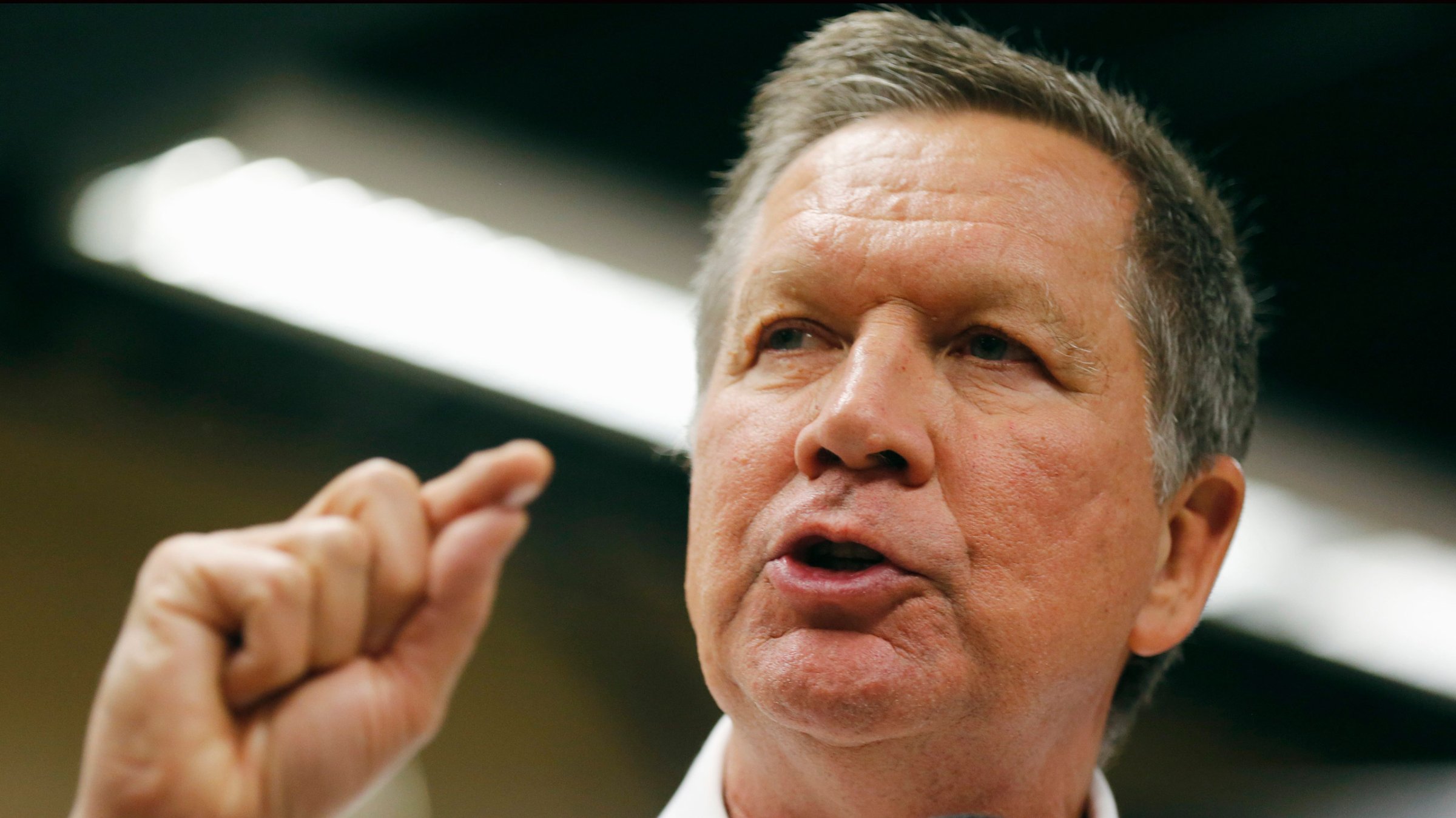 Republican presidential candidate, Ohio Gov. John Kasich speaks during a campaign stop in the meeting room of the Conway, N.H. public library, Friday, Jan. 15, 2016. (AP Photo/Jim Cole)