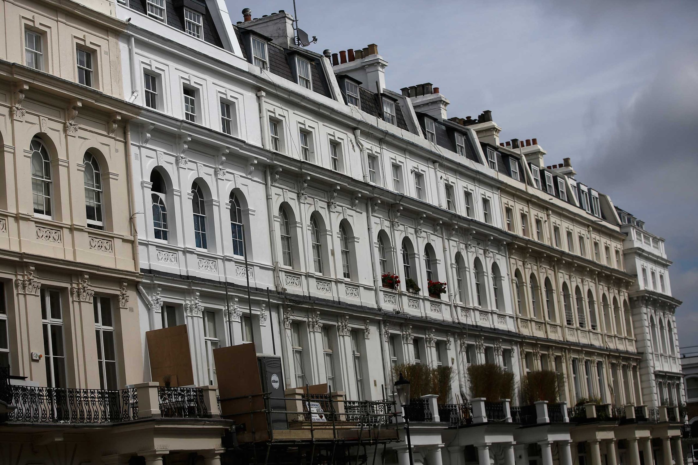 Rows of luxury residential properties stand in the Kensington and Chelsea districts of London, Aug. 10, 2015.