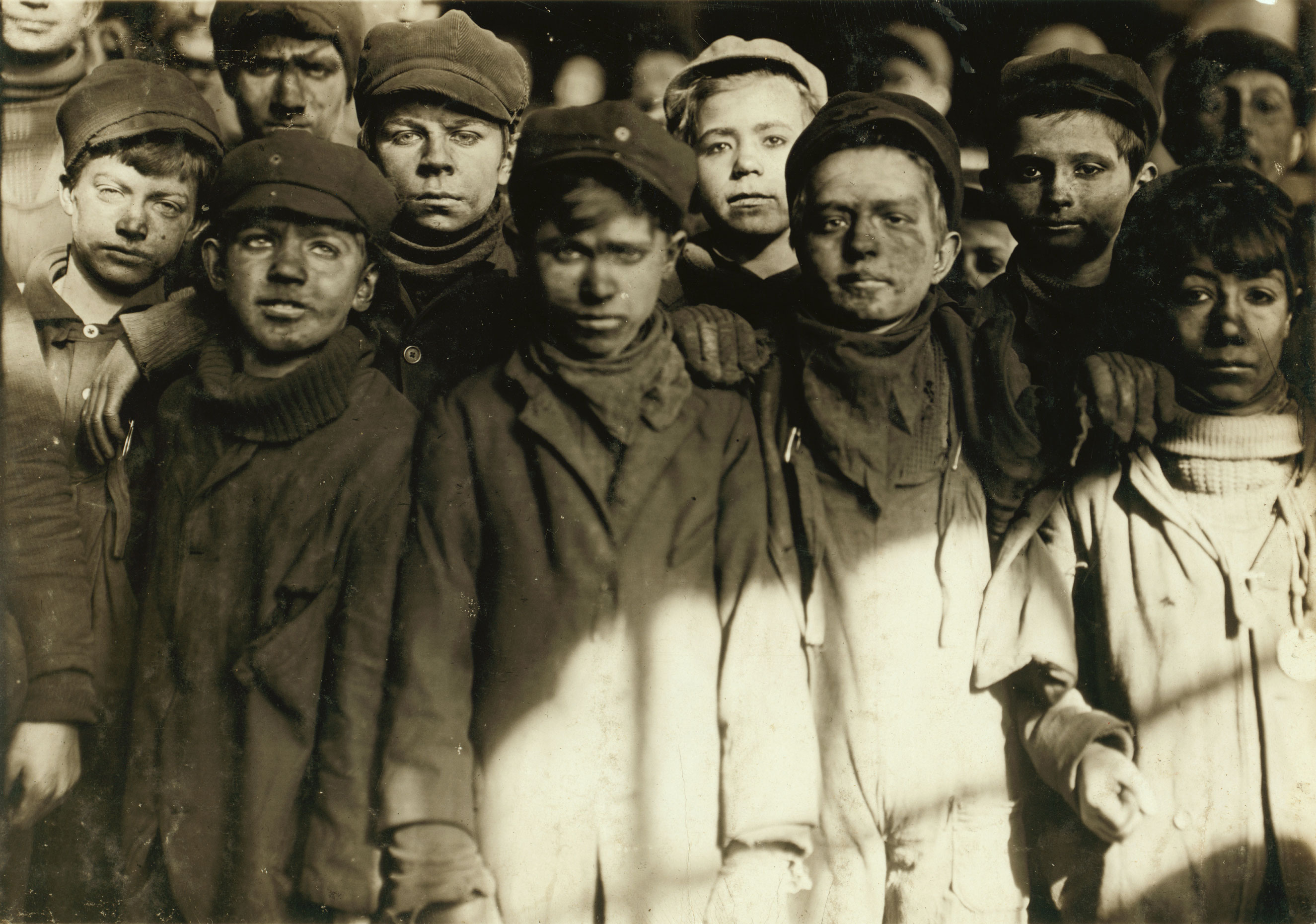 Group of Breaker Boys in #9 Breaker, Hughestown Borough, Pennsylvania Coal Co. Smallest boy is Angelo Ross. Jan. 1911. Pittston, Pennsylvania.