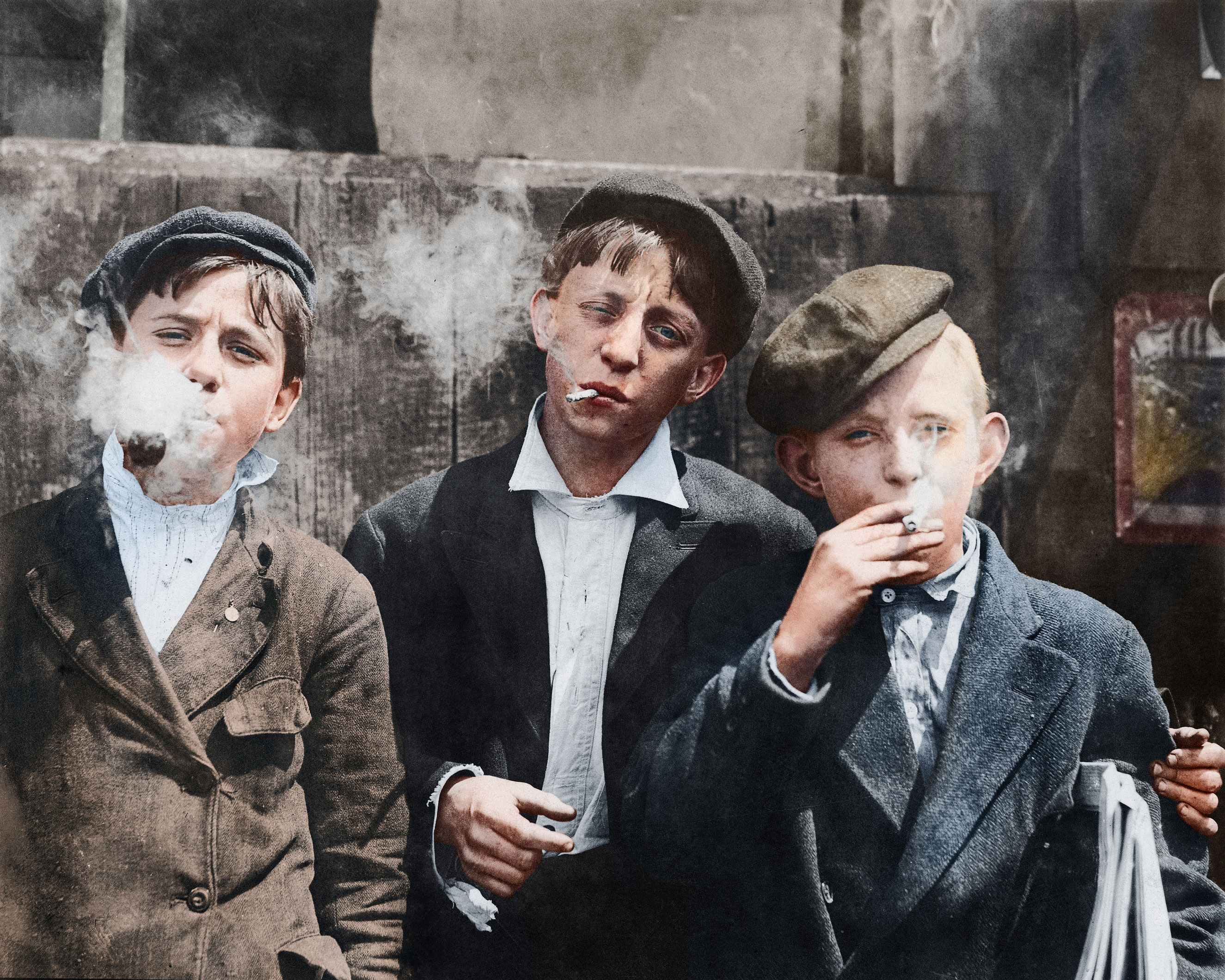 11:00 A. M . Monday, May 9th, 1910. Newsies at Skeeter's Branch, Jefferson near Franklin. They were all smoking. May 1910. St. Louis, Missouri.