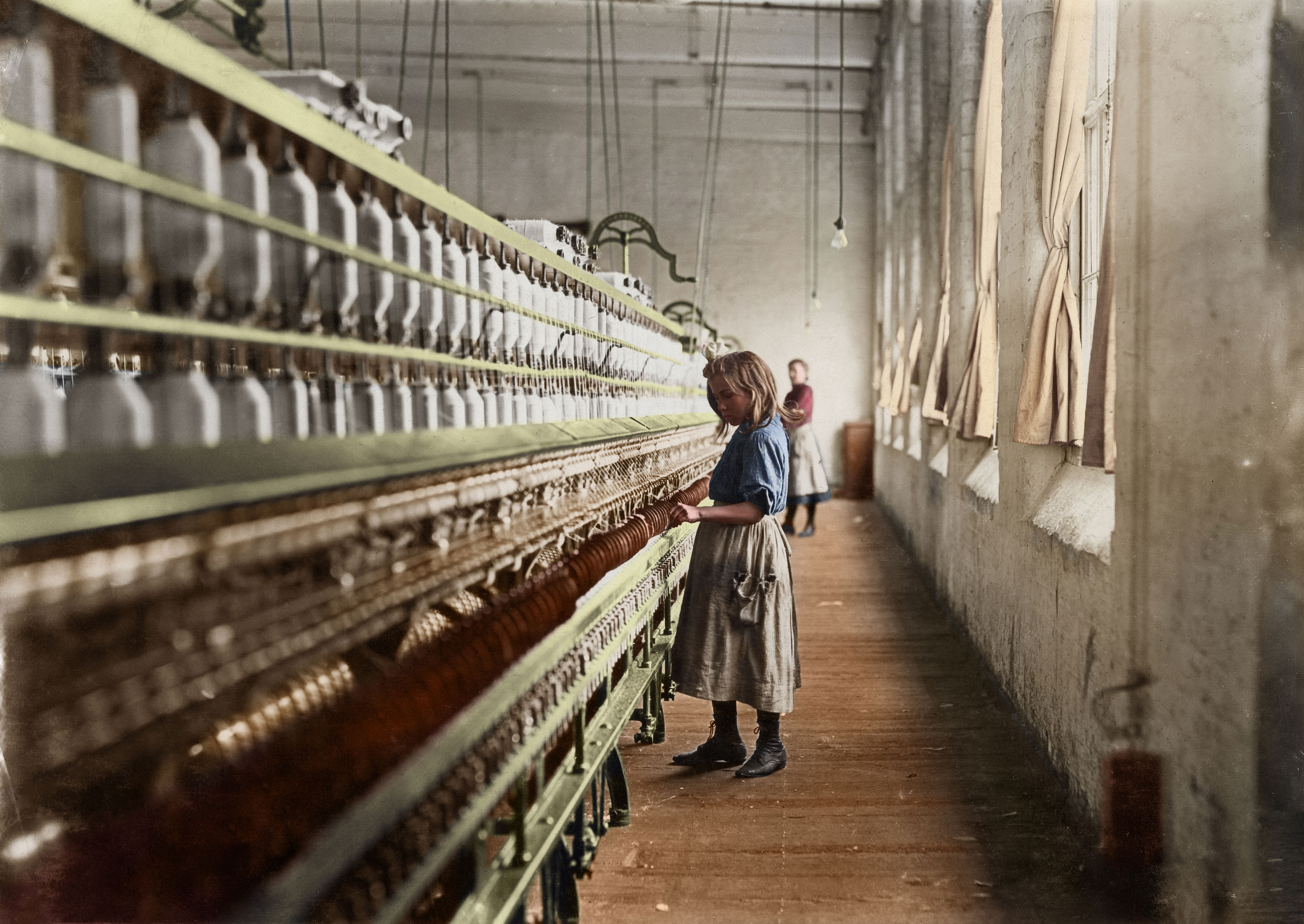 Sadie Pfeifer, 48 inches high, has worked half a year. One of the many small children at work in Lancaster Cotton Mills. Nov. 1908. Lancaster, South Carolina.