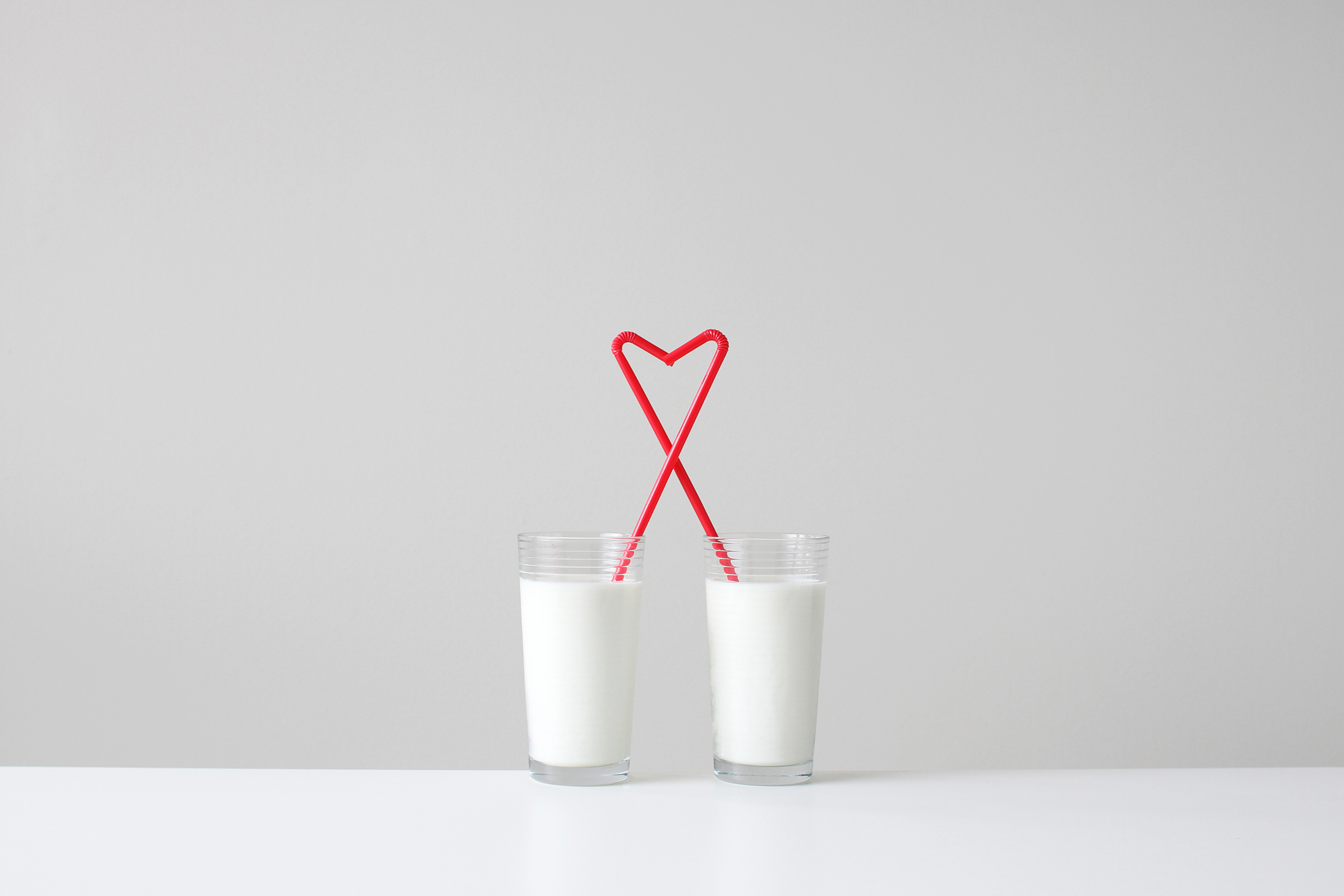 love-two-glasses-milk-hearts-straws-happiness-relationships-motto-stock