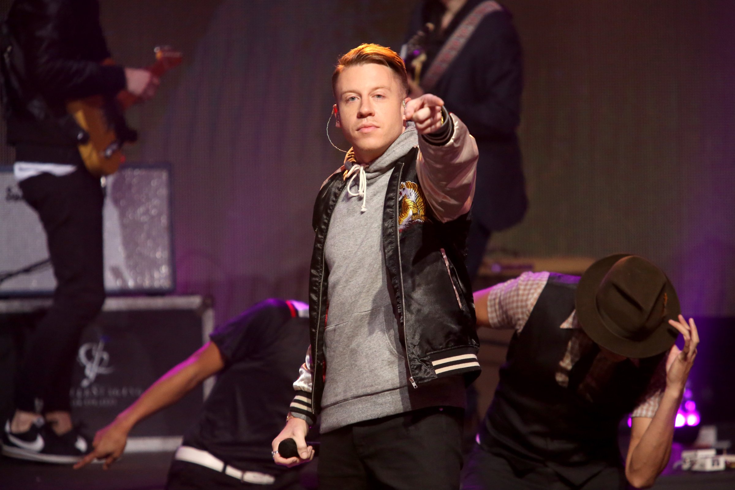 Macklemore performs onstage at Dick Clark's New Year's Rockin' Eve with Ryan Seacrest 2016 on December 31, 2015 in Los Angeles, CA.