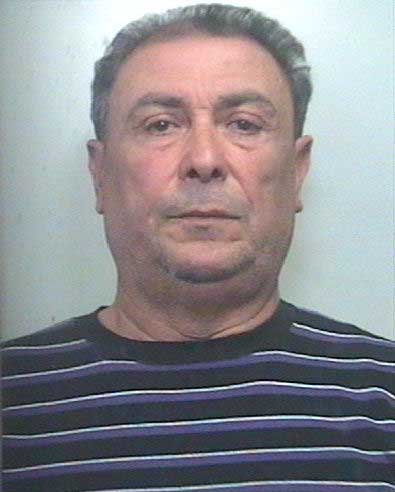 Salvatore Greco, 61, head of the Brunetto Sicilian mafia clan of Riposto, a small town on the Ionian coast of Sicily who organized immigration smuggling together with Egyptian smugglers, is seen in a mug shot in Siracusa, March 24, 2011.