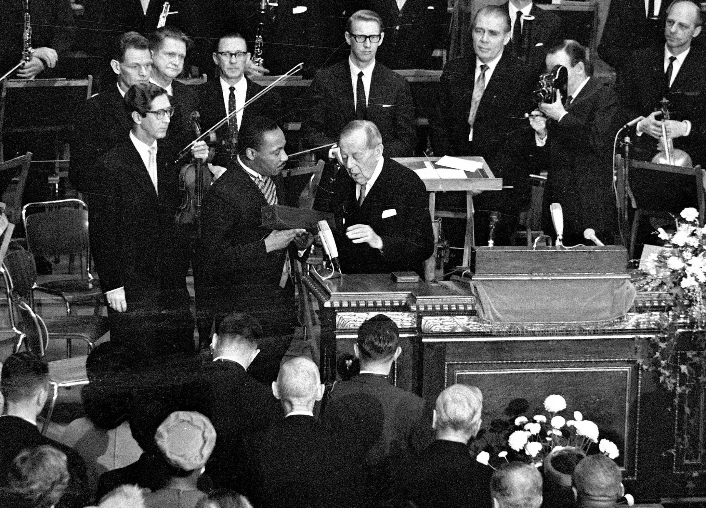 In this Dec. 10, 1964, file photo, U.S. civil rights leader Rev. Dr. Martin Luther King receives the Nobel Peace Prize from Gunnar Jahn, chairman of the Nobel Committee, in Oslo, Norway. (AP Photo, File)