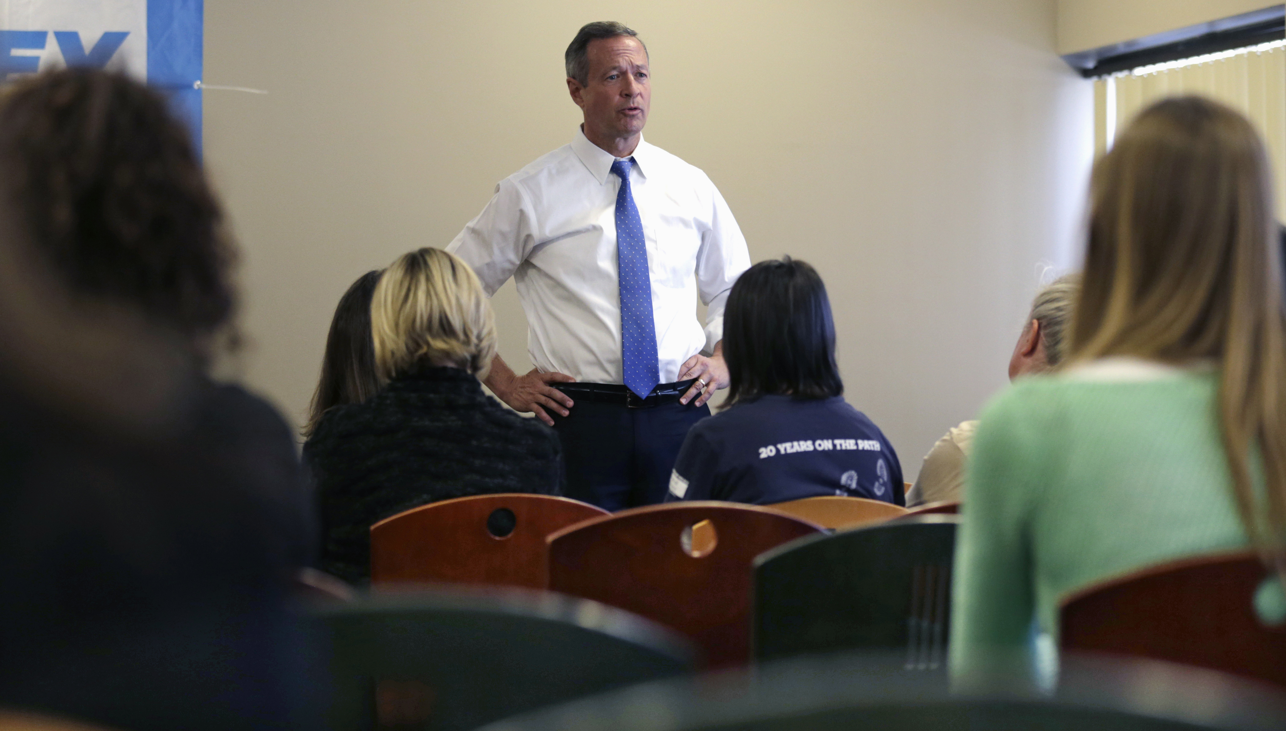 Democratic presidential candidate, former Maryland Gov. Martin O'Malley talks with employees during a campaign stop at at the Timberland apparel company in Stratham, N.H., Thursday, Jan. 21, 2016. (Charles Krupa—AP)