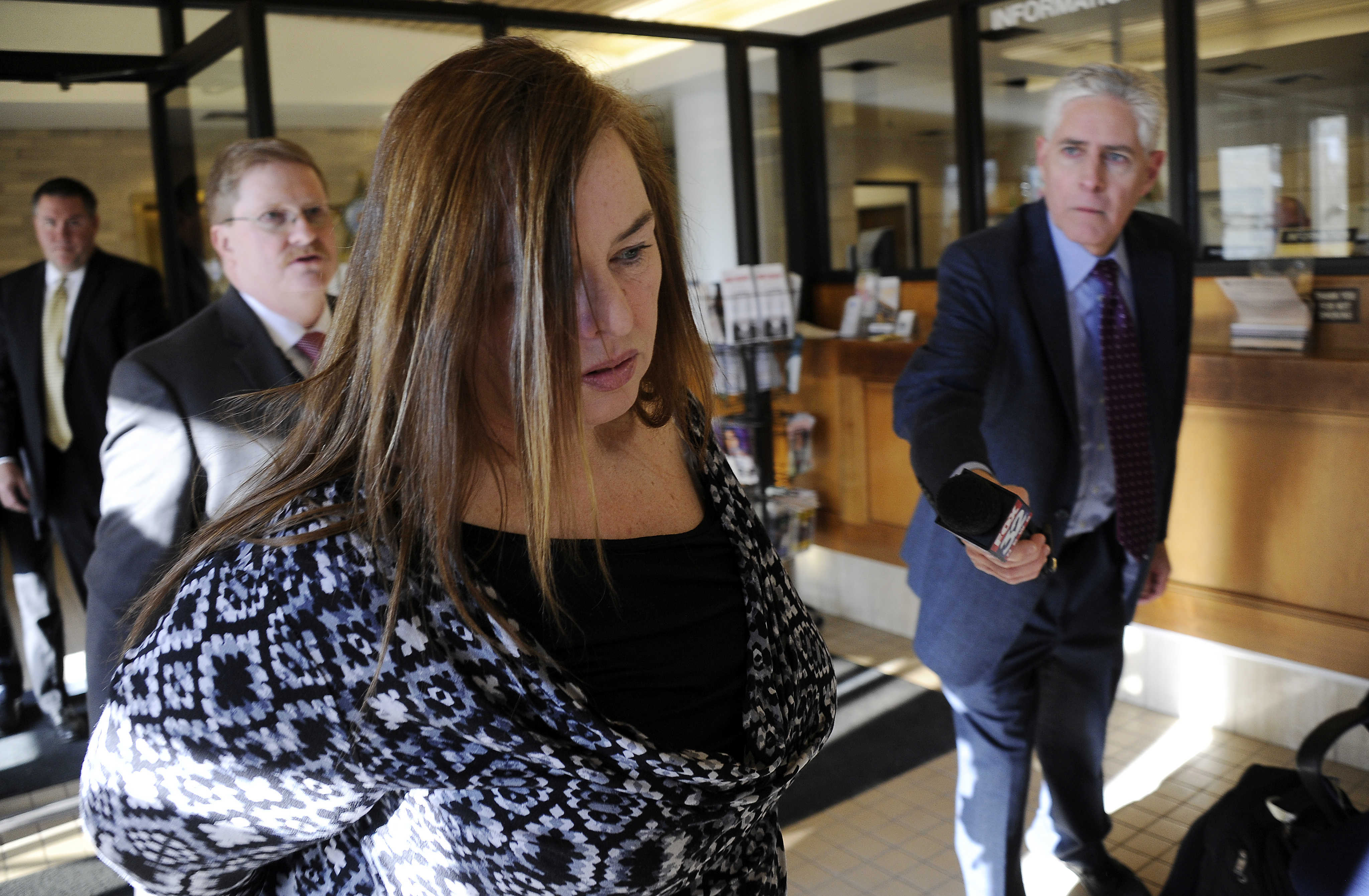 Melodie Gliniewicz, 51, of Antioch,Ill.,  appearars at the Lake County sheriff's office after she was indicted in Waukegan, Ill., by a Lake County grand jury. (Mark Welsh—AP)