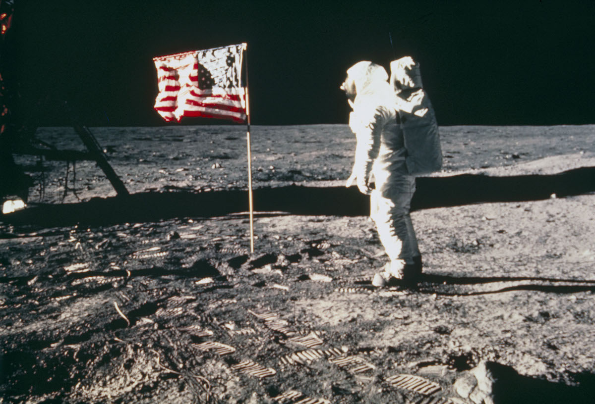 Buzz Aldrin shown standing beside the United States flag during Apollo 11, the first manned lunar landing mission. (Science &amp; Society Picture Library / Getty Images)