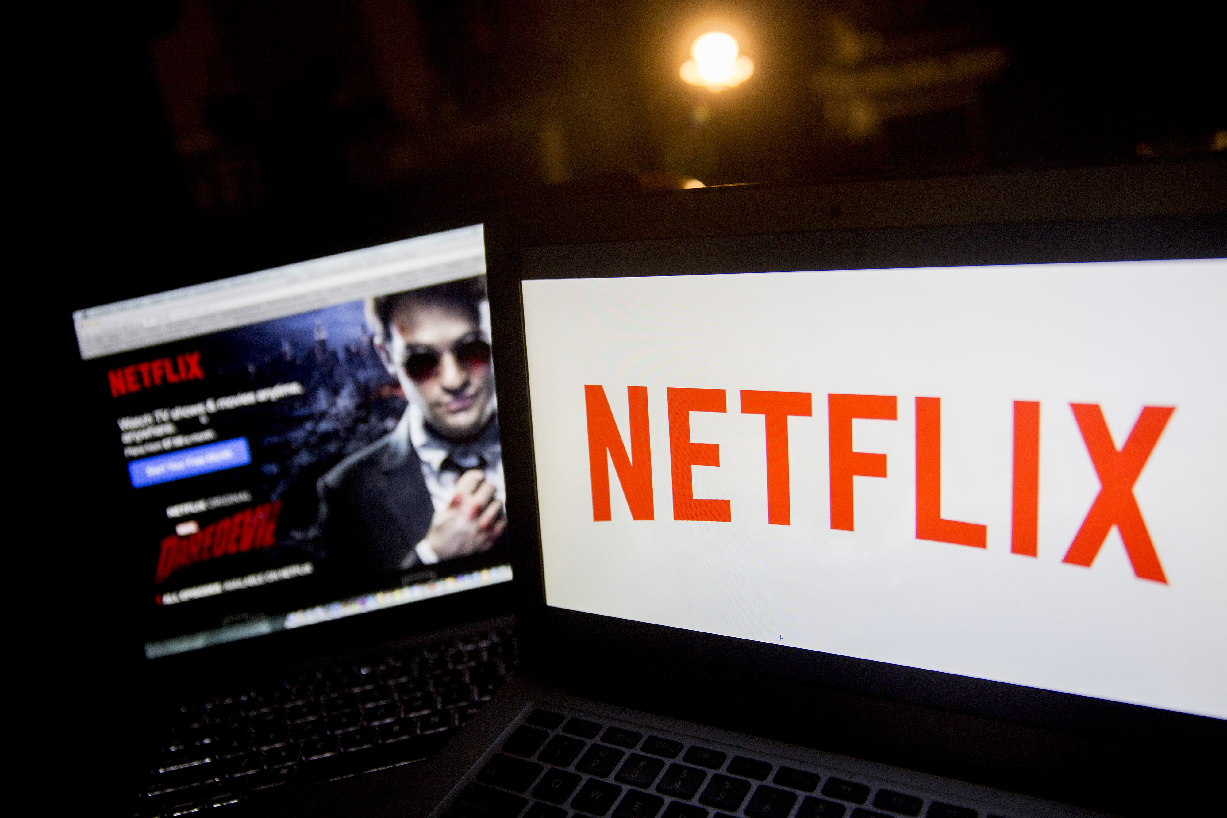The Netflix Inc. logo and website are displayed on laptop computers for a photograph in Washington, D.C., U.S., on Tuesday, April 14, 2015. (Andrew Harrer—Bloomberg/Getty Images)