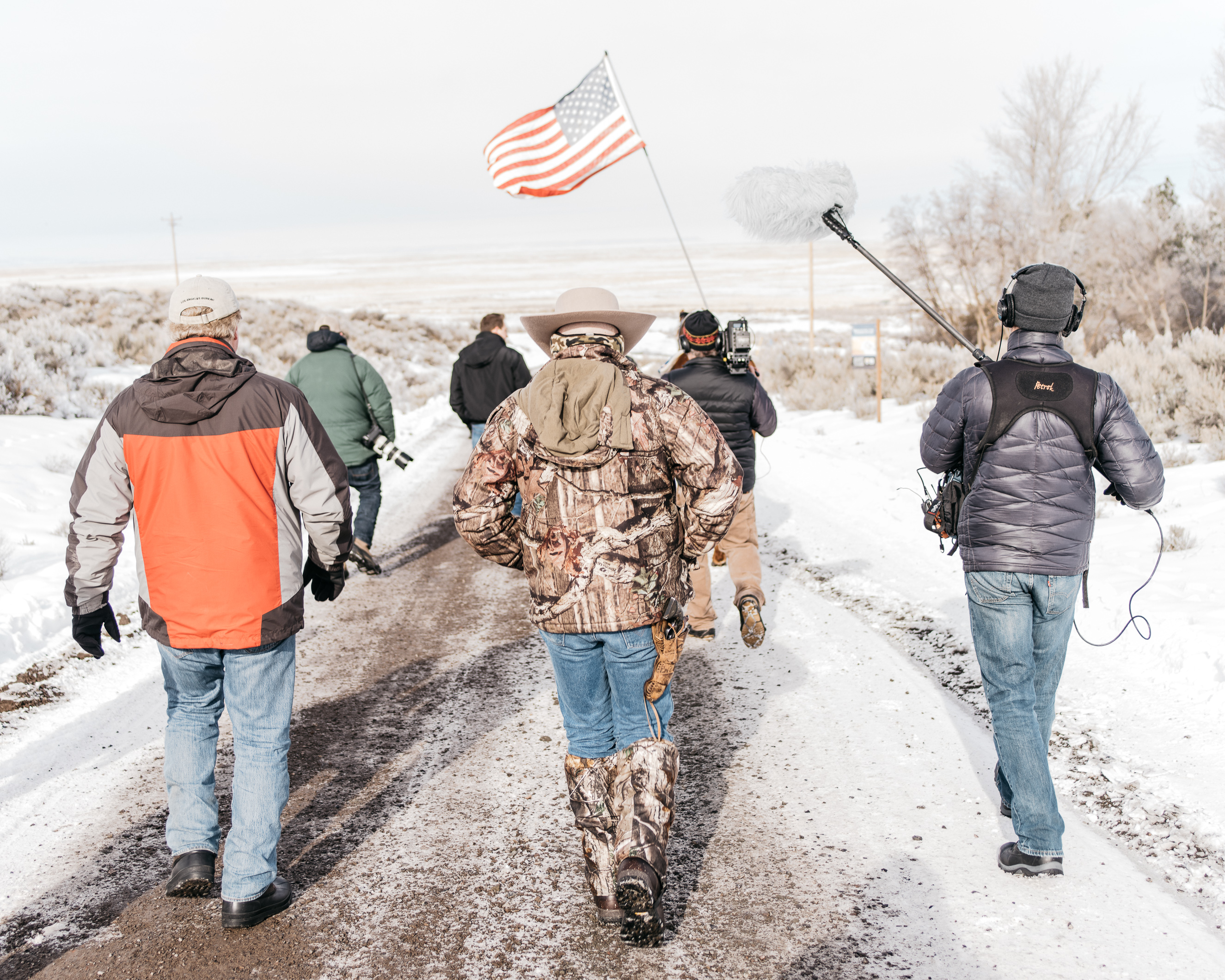 LaVoy Finicum, of Chino Valley, Ariz., walks back to the refuge after speaking with reporters on Jan. 12, 2016.