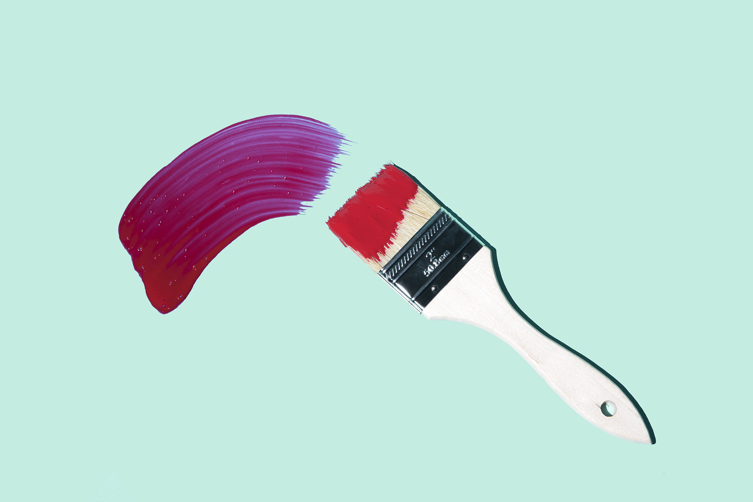 paint-brush-2-color-advice-betterment-home-improvement-motto-stock