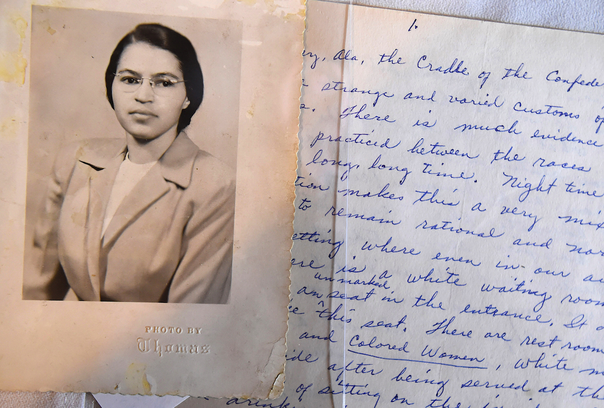 A photo and a hand written page that is part of a Rosa Parks archive during a press event at the Library of Congress James Madison Memorial Building, seen on Jan. 29, 2015 in Washington, DC. (Matt McClain—The Washington Post / Getty Images)