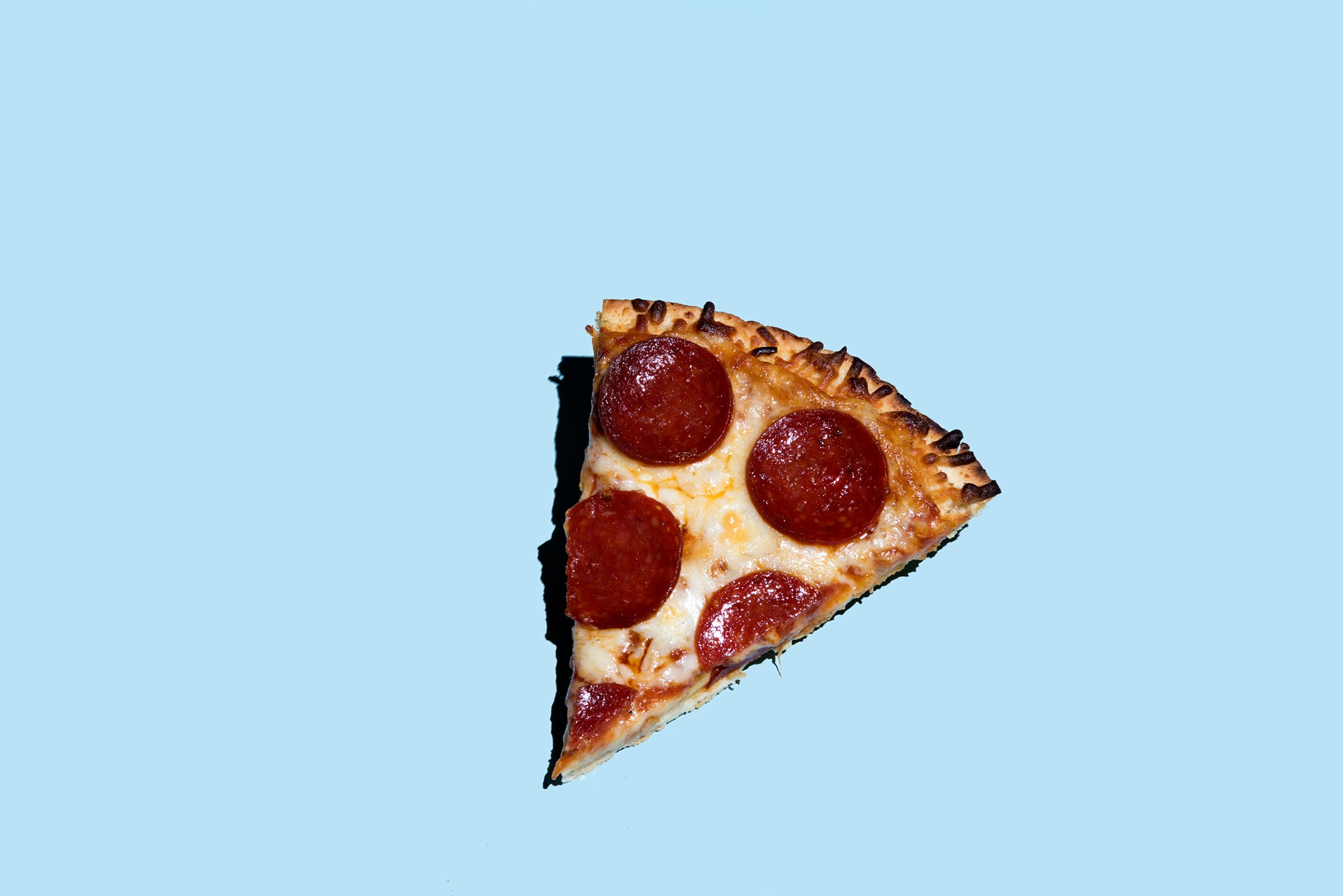 pizza-slice-pepperoni-cheese-junk-food-diet-health-motto-stock