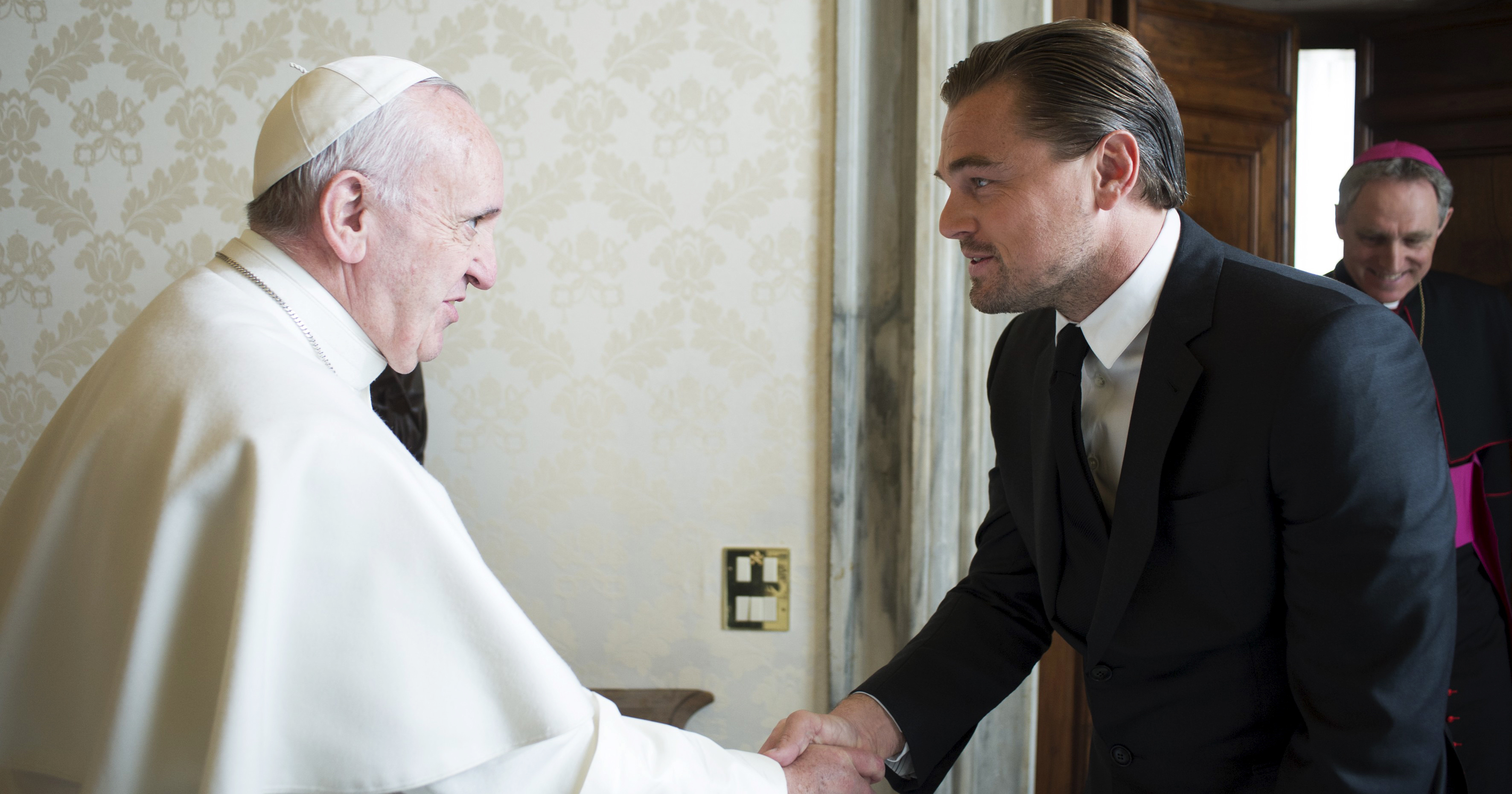 Pope Francis shakes hands with Leonardo DiCaprio at the Vatican on Jan. 28, 2016.