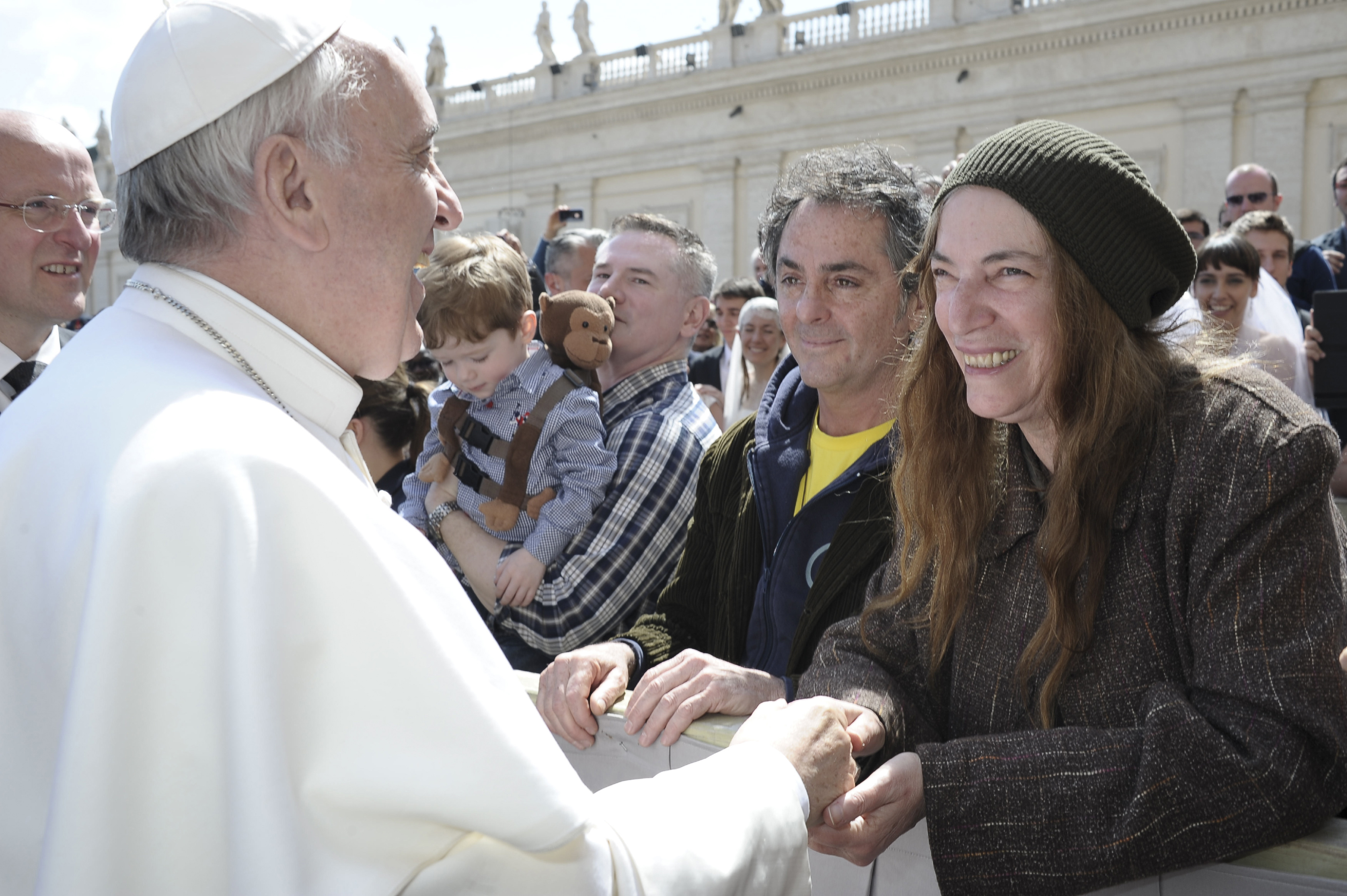 Pope Francis greets Patti Smith at the Vatican on April 10, 2013.