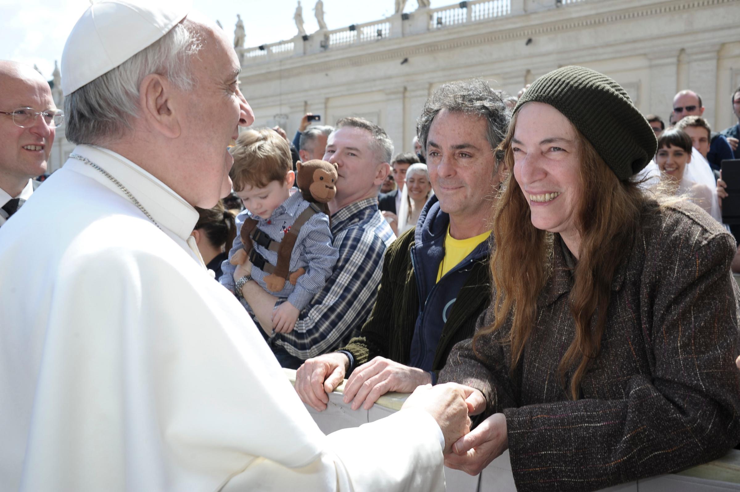 Pope Francis greets Patti Smith on April 10, 2013 at the Vatican.
