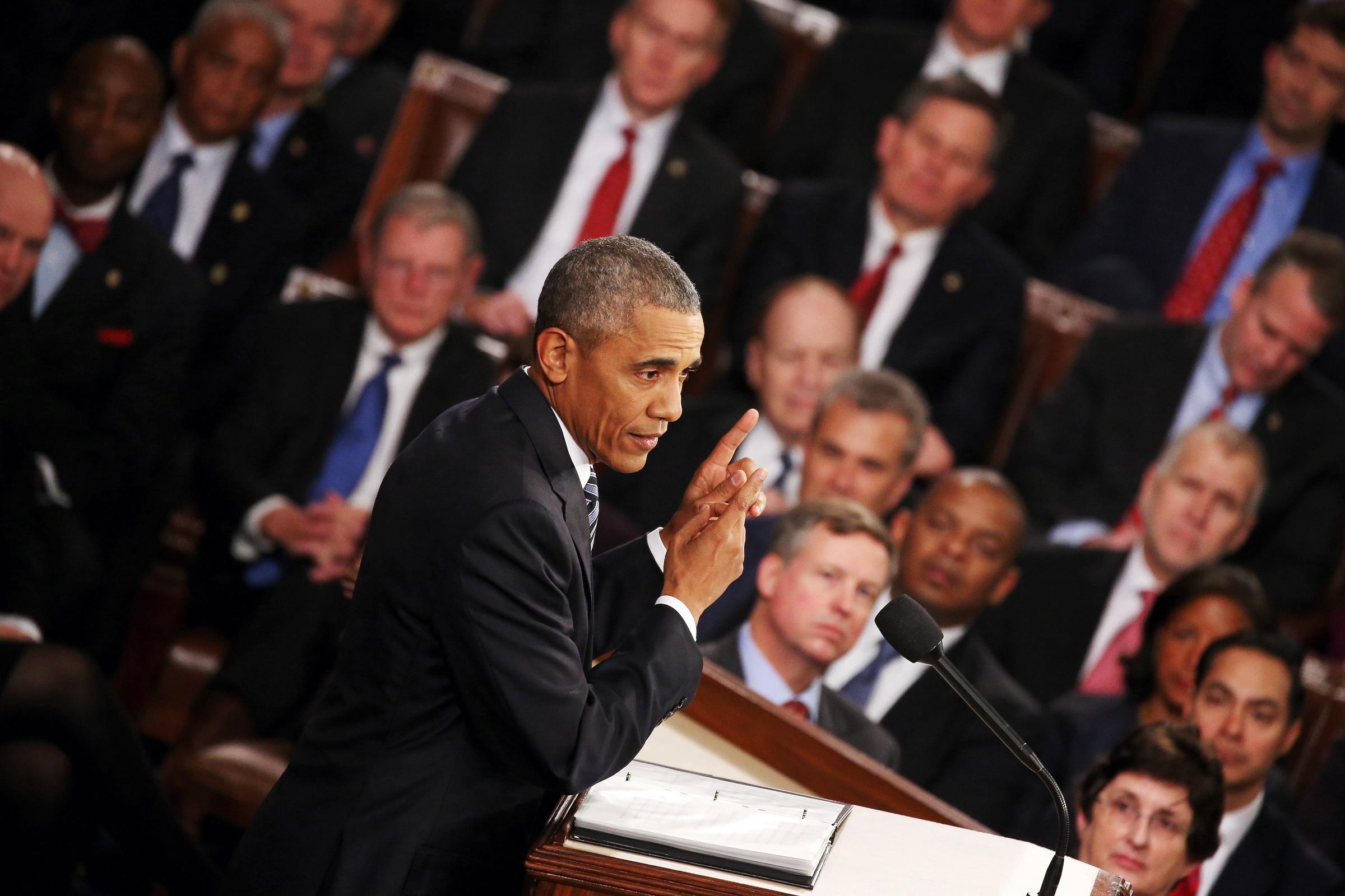 President Barack Obama gestures as he delivers the State of the Union speech before members of Congress in the House chamber of the U.S. Capitol on Jan. 12, 2016 in Washington.