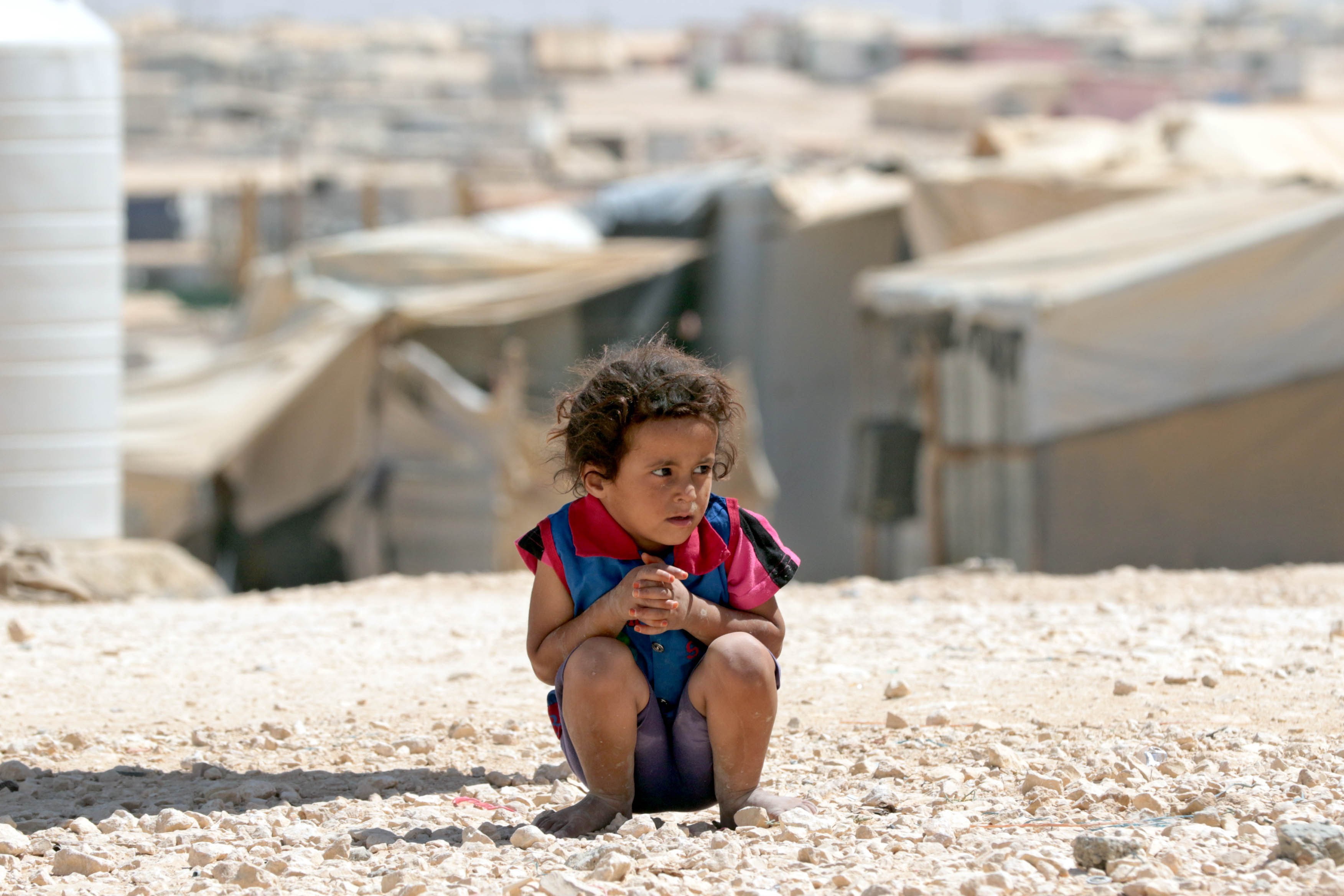 A young Syrian refugee looks on at the UN-run Zaatari camp, north east of the Jordanian capital Amman, on Sept. 19, 2015. (Khalil Mazraawi—AFP/Getty Images)