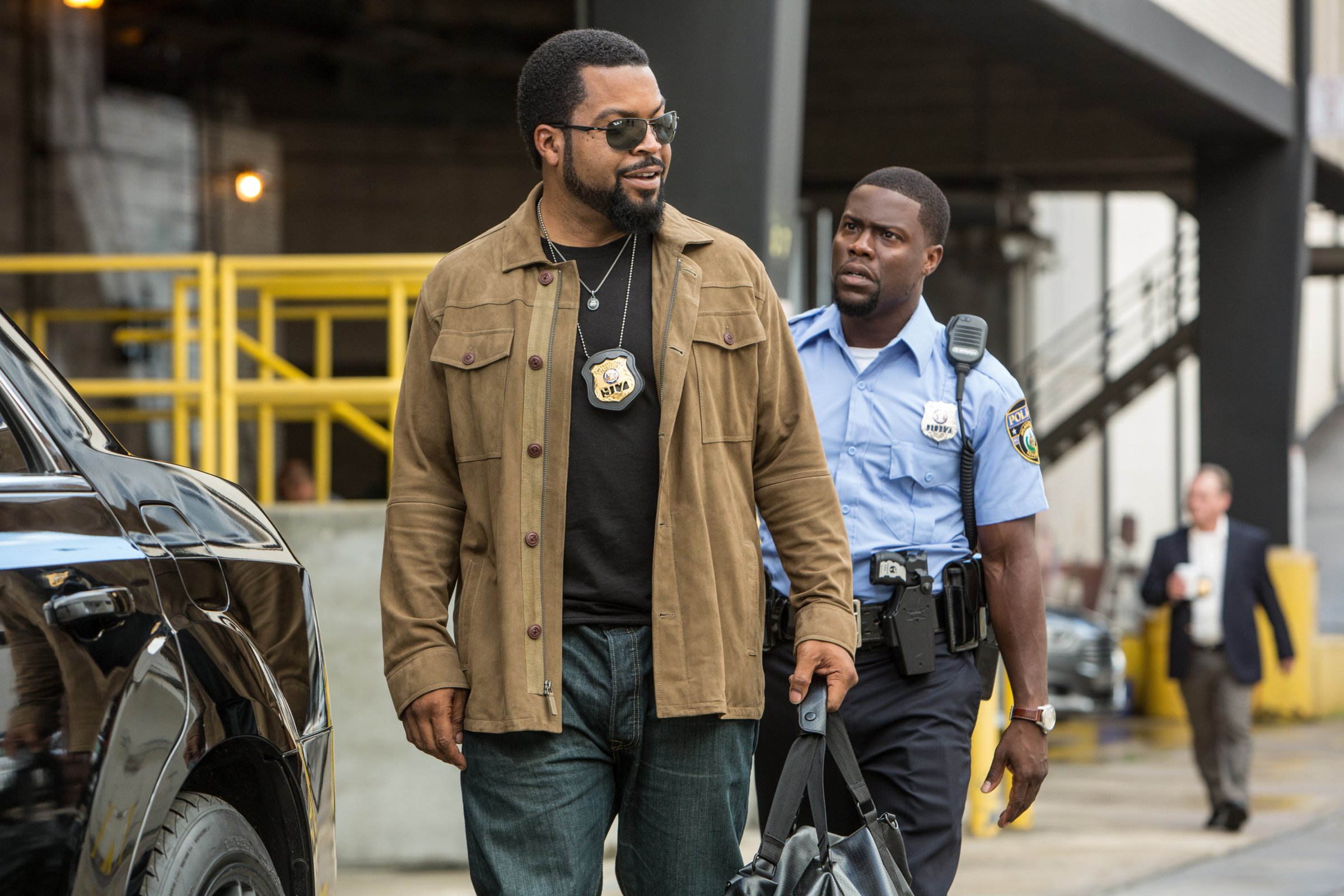 Ice Cube, left, as James Payton and Kevin Hart, right, as Ben Barber in a scene from Ride Along 2.