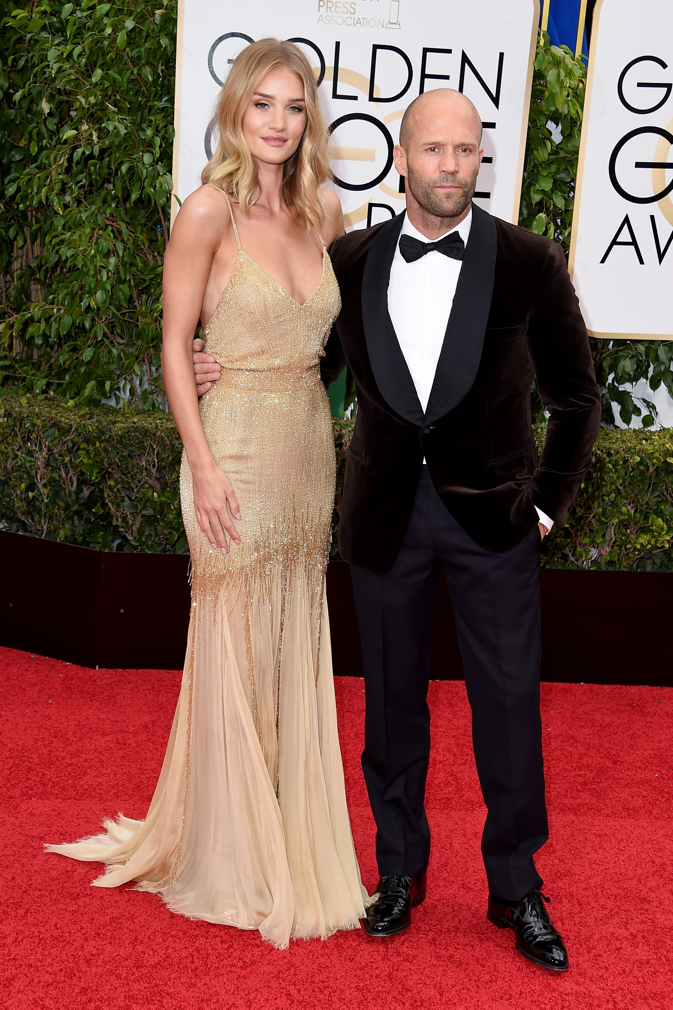 Rosie Huntington-Whiteley and Jason Statham arrive to the 73rd Annual Golden Globe Awards on Jan. 10, 2016 in Beverly Hills.