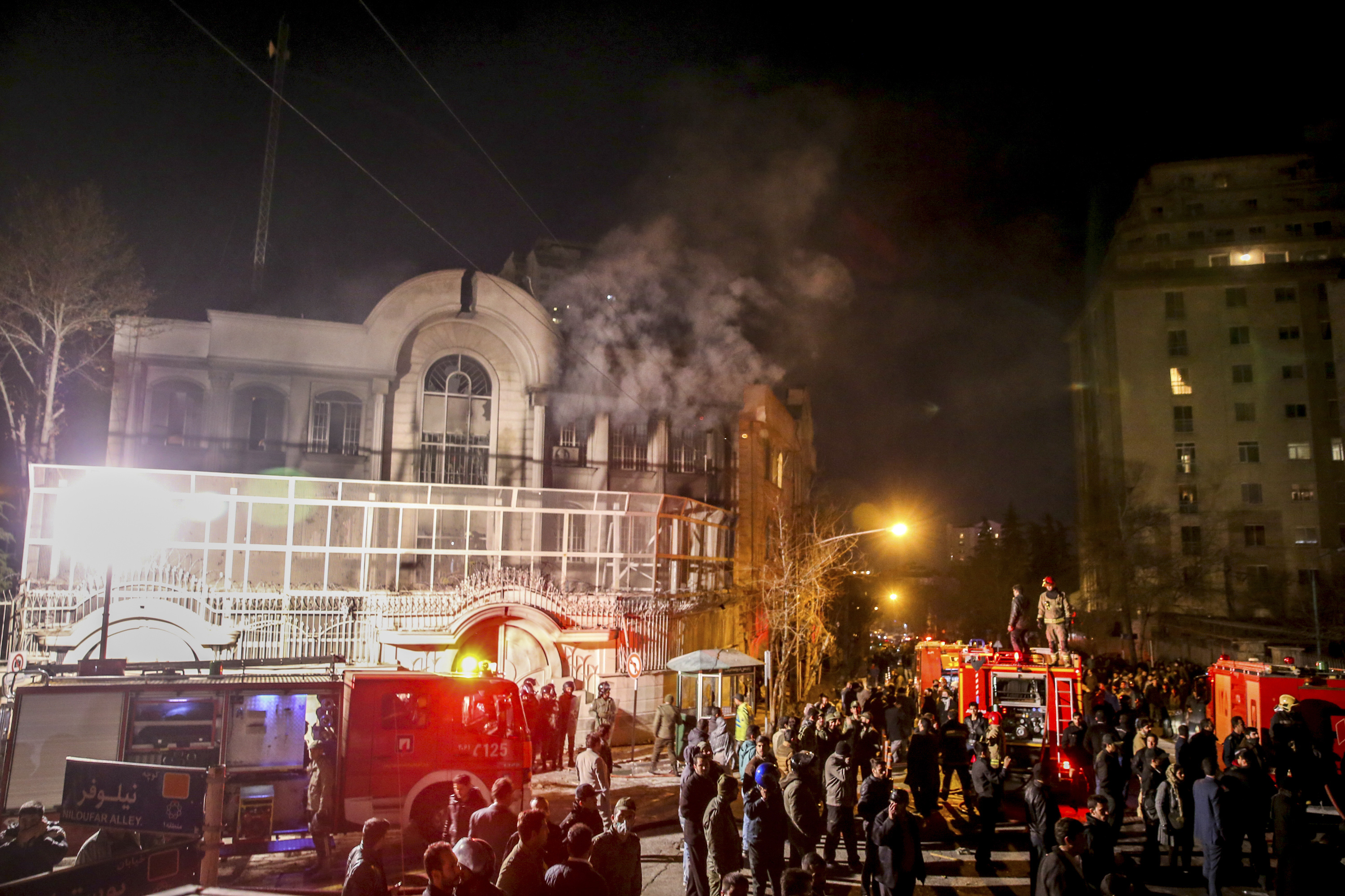 Smoke rises as Iranian protesters, upset over the execution of Shiite cleric Nimr al-Nimr in Saudi Arabia, set fire to the Saudi embassy in Tehran on Jan. 3, 2016. (Mohammadreza Nadimi—AP)
