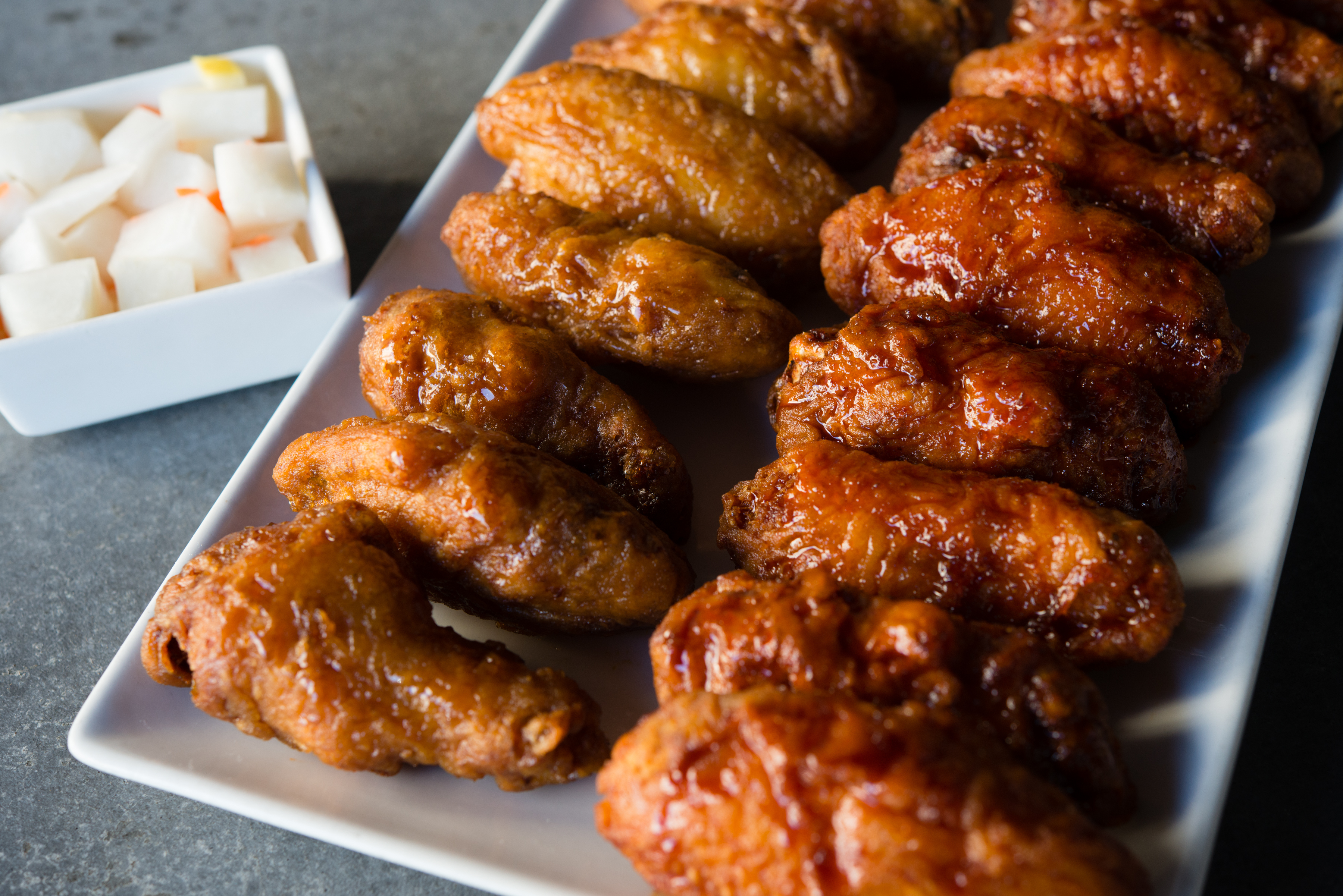 An order of Momo's Korean Fried Chicken wings are pictured. (Sarah L. Voisin—The Washington Post)