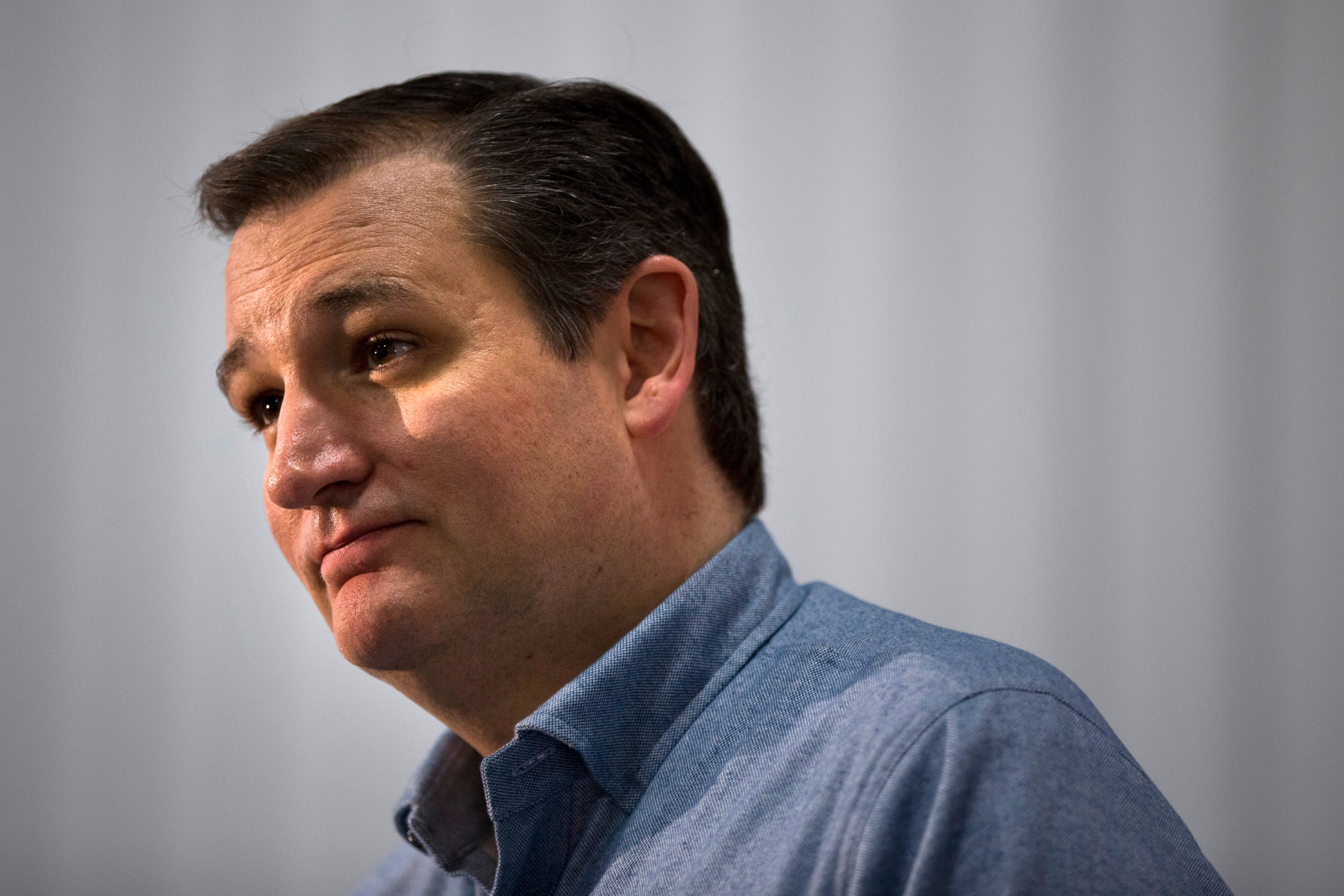 Ted Cruz listens to a question during a campaign event in Webster City, IO on Jan. 7, 2016. (Jae C. Hong—AP)