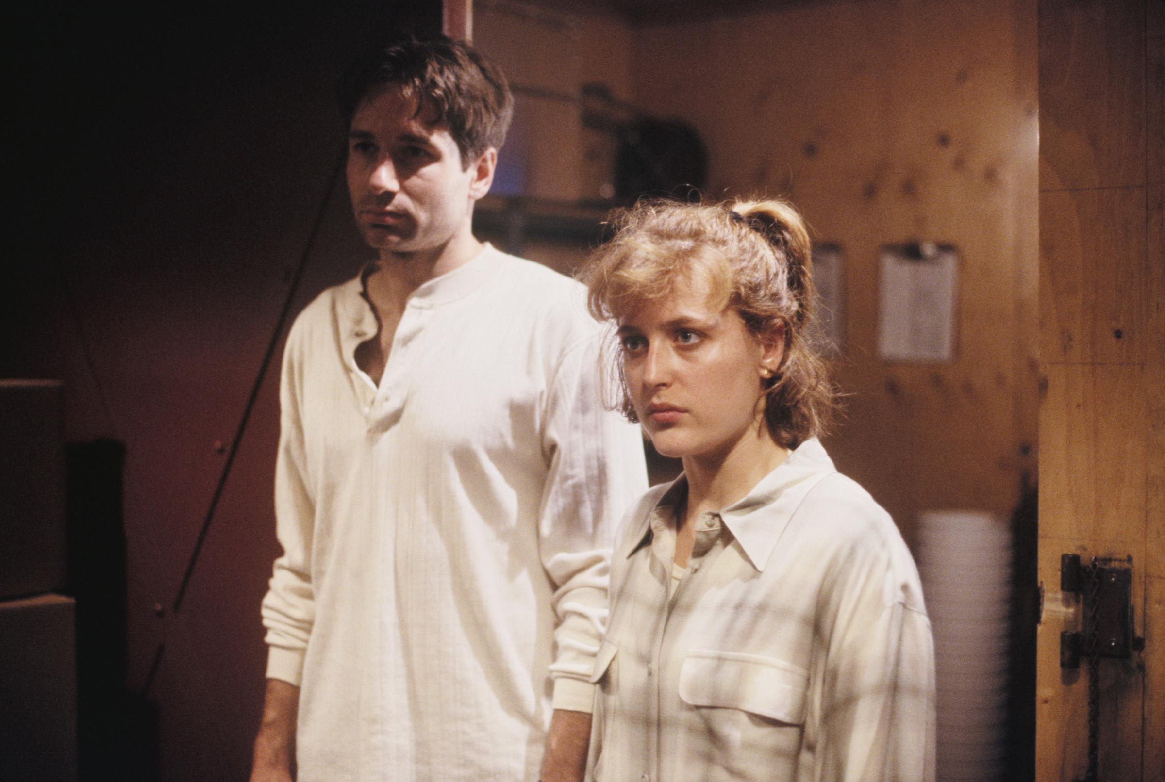 Gillian Anderson and David Duchovny are seen in a still from The X-Files in 1993.