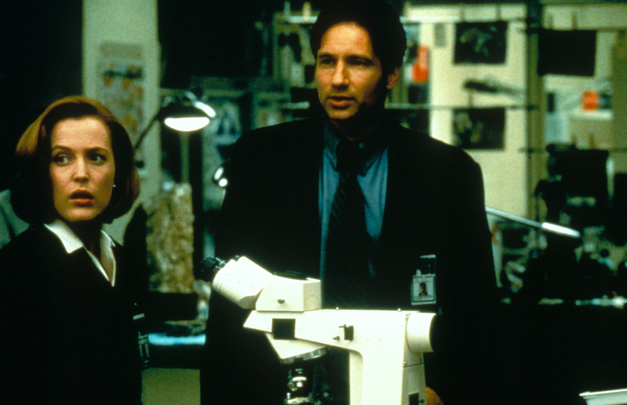 Gillian Anderson and David Duchovny are seen in The X-Files film in 1998.