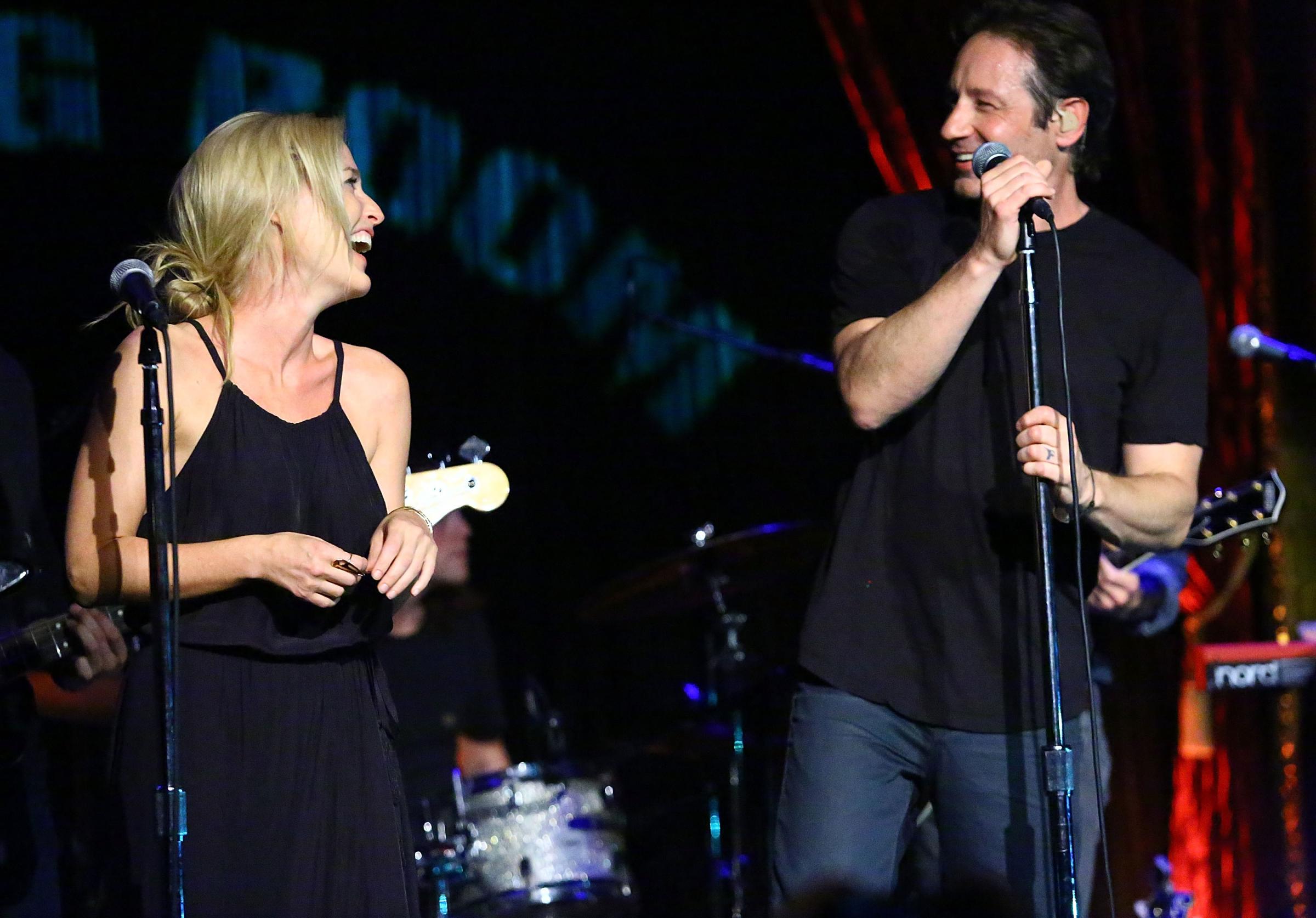 Gillian Anderson and David Duchovny perform at The Cutting Room in New York City on May 12, 2015.