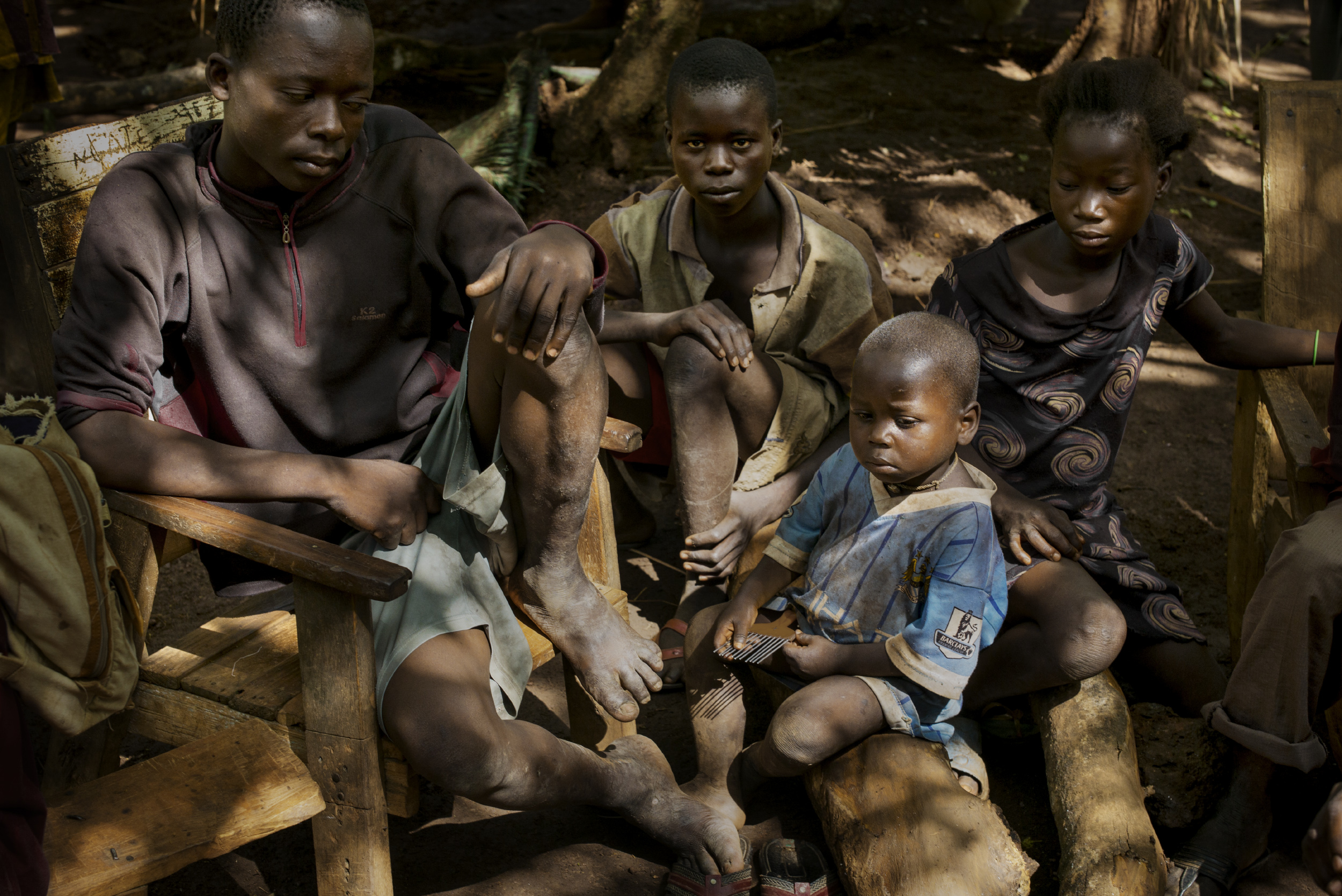 Some of the 4,700 people who live in the bush after an attack on the village of Marzé, where 114 houses were burned in late July, are seen on Aug. 2, 2015.