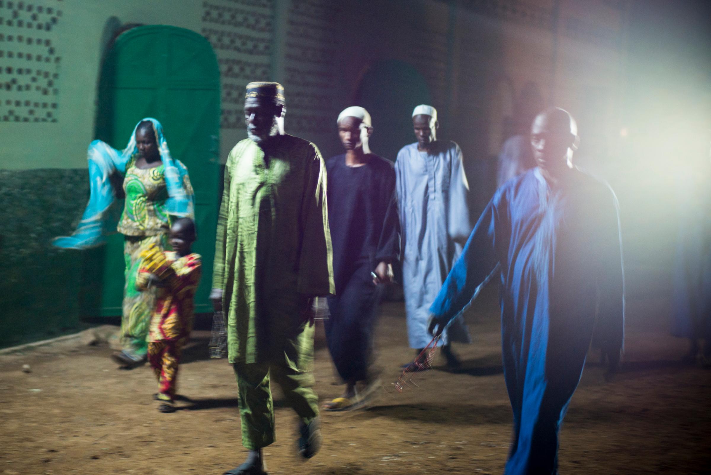 Muslims leave the central mosque after the first prayer of the day in Bangui, Central African Republic, Nov. 30, 2015.