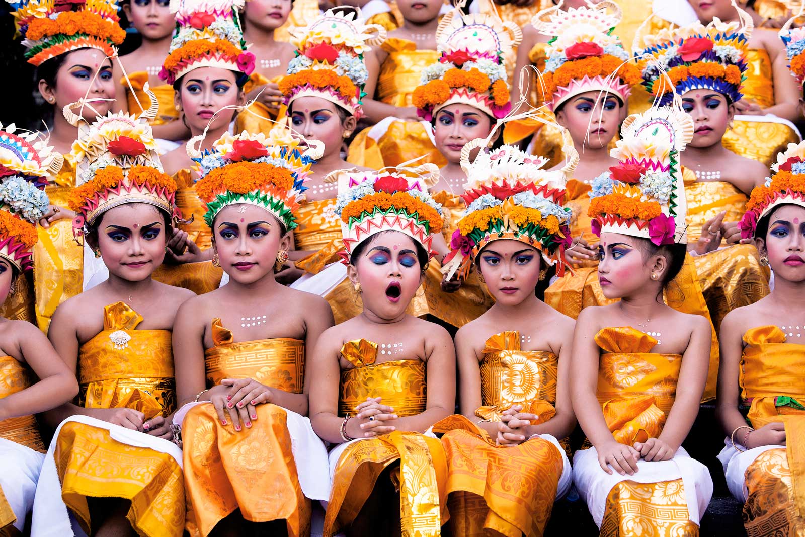Young girls wait for their turn to perform at the Melasti Festival in Bali, which is conducted once a year in conjunction with Nyepi or Silent Day.