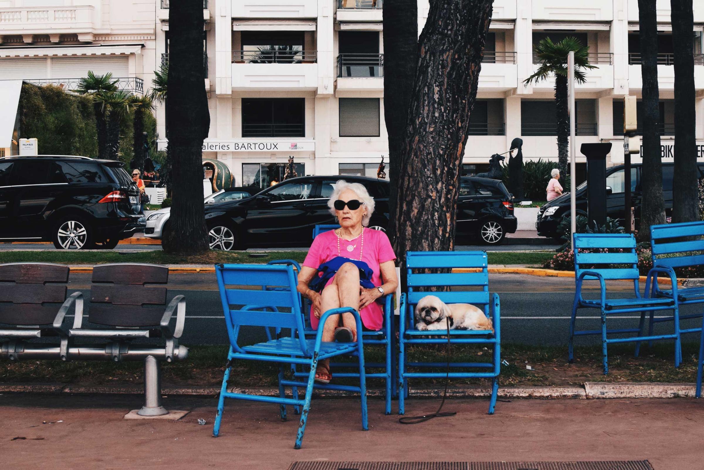 A woman relaxes along the Promenade de la Croisette in Cannes, France in 2015.
