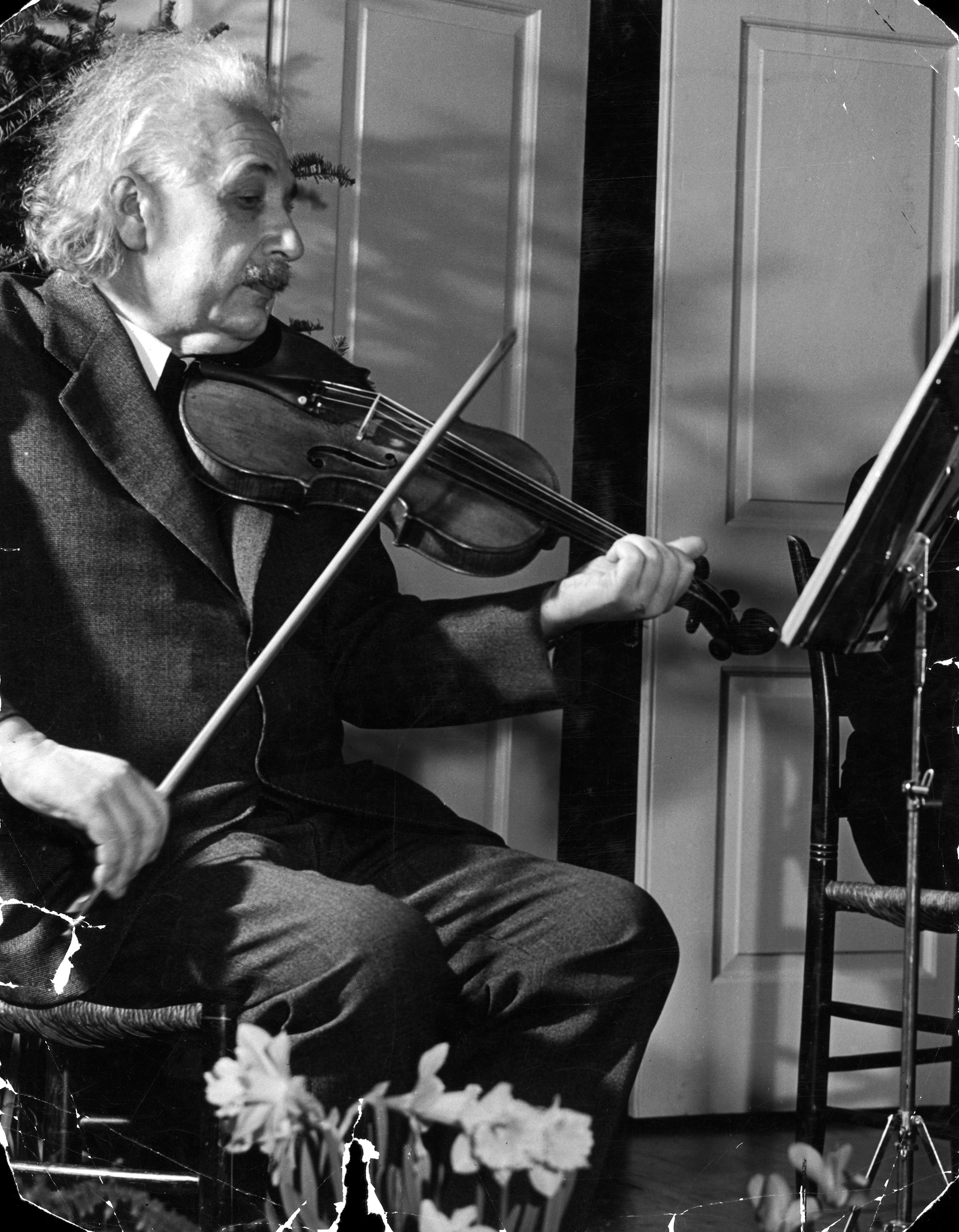 Physicist Dr. Albert Einstein playing his beloved violin, 1941.
