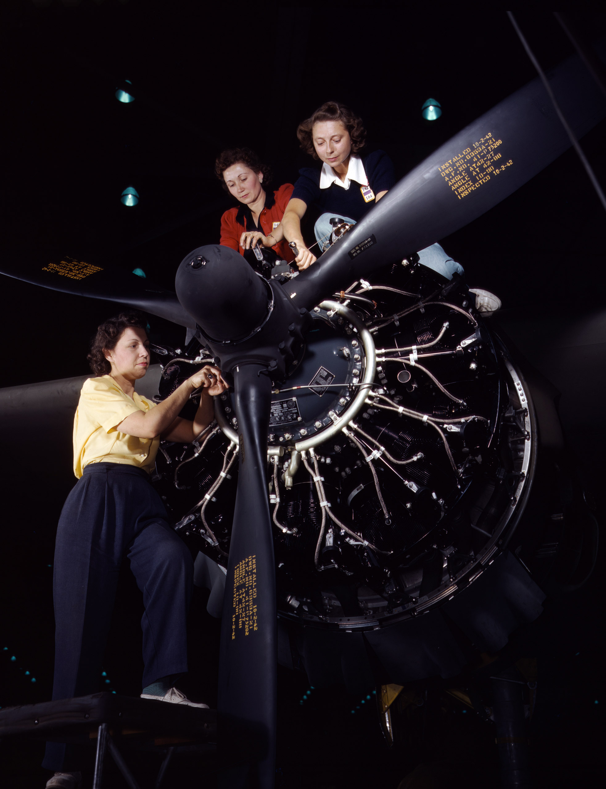 Women at work on bomber, Douglas Aircraft Company, Long Beach, California, October 1942. Photographed by Alfred T. Palmer for the Farm Security Administration.