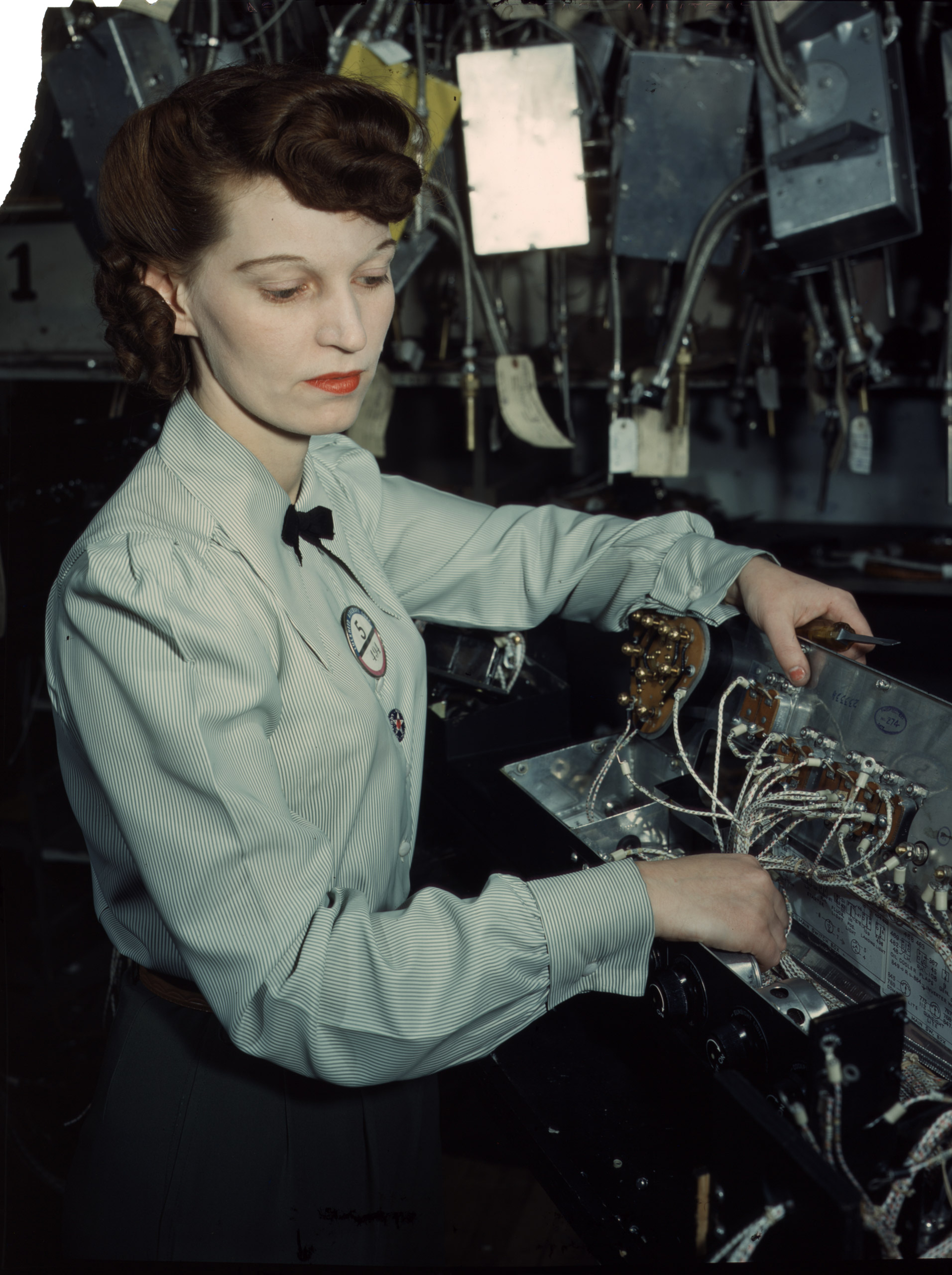 Electronics technician, Goodyear Aircraft Corp., Akron, Ohio, December 1941. Photographed by Alfred T. Palmer for the Farm Security Administration.
