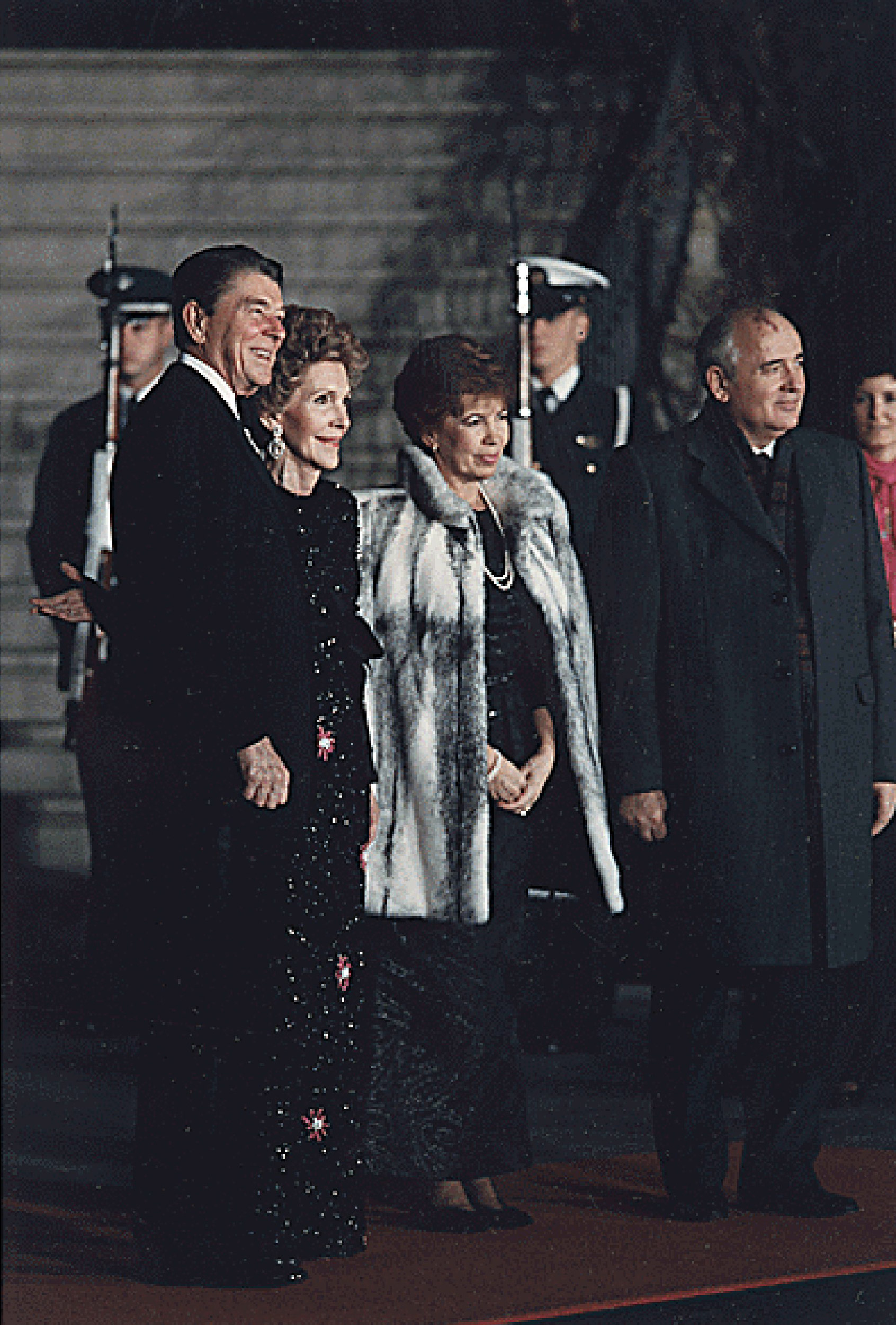 President Ronald Reagan and First Lady Nancy Reagan welcome USSR General Secretary Mikhail Gorbachev and his wife, Raisa, to the White House for a State Dinner in their honor. December 8, 1987.