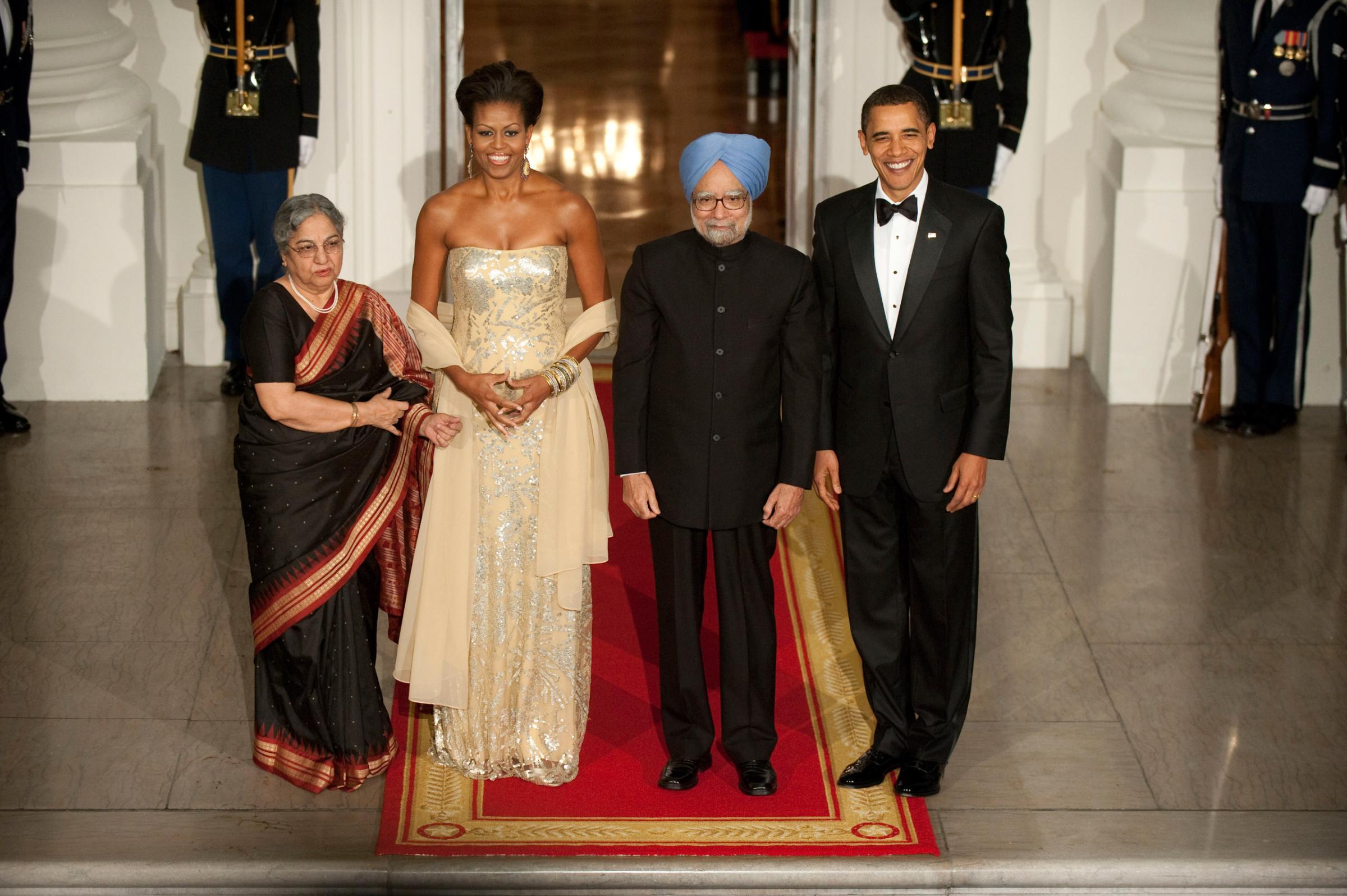 President Barack Obama and the The First Lady Michelle Obama welcomes Prime Minister Dr. Manmohan Singh and Mrs. Gursharan Kaur to the first White House State Dinner.