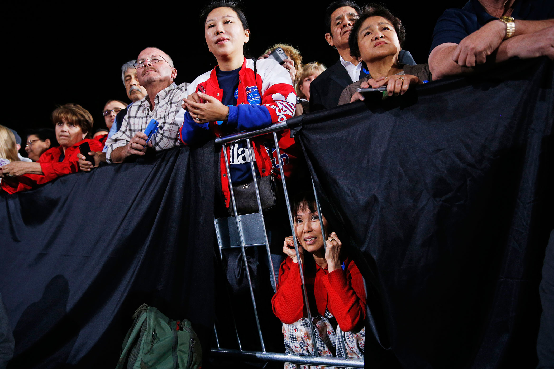 Supporters watch Hillary Clinton speak during a rally on Feb. 19, 2016, in Las Vegas.