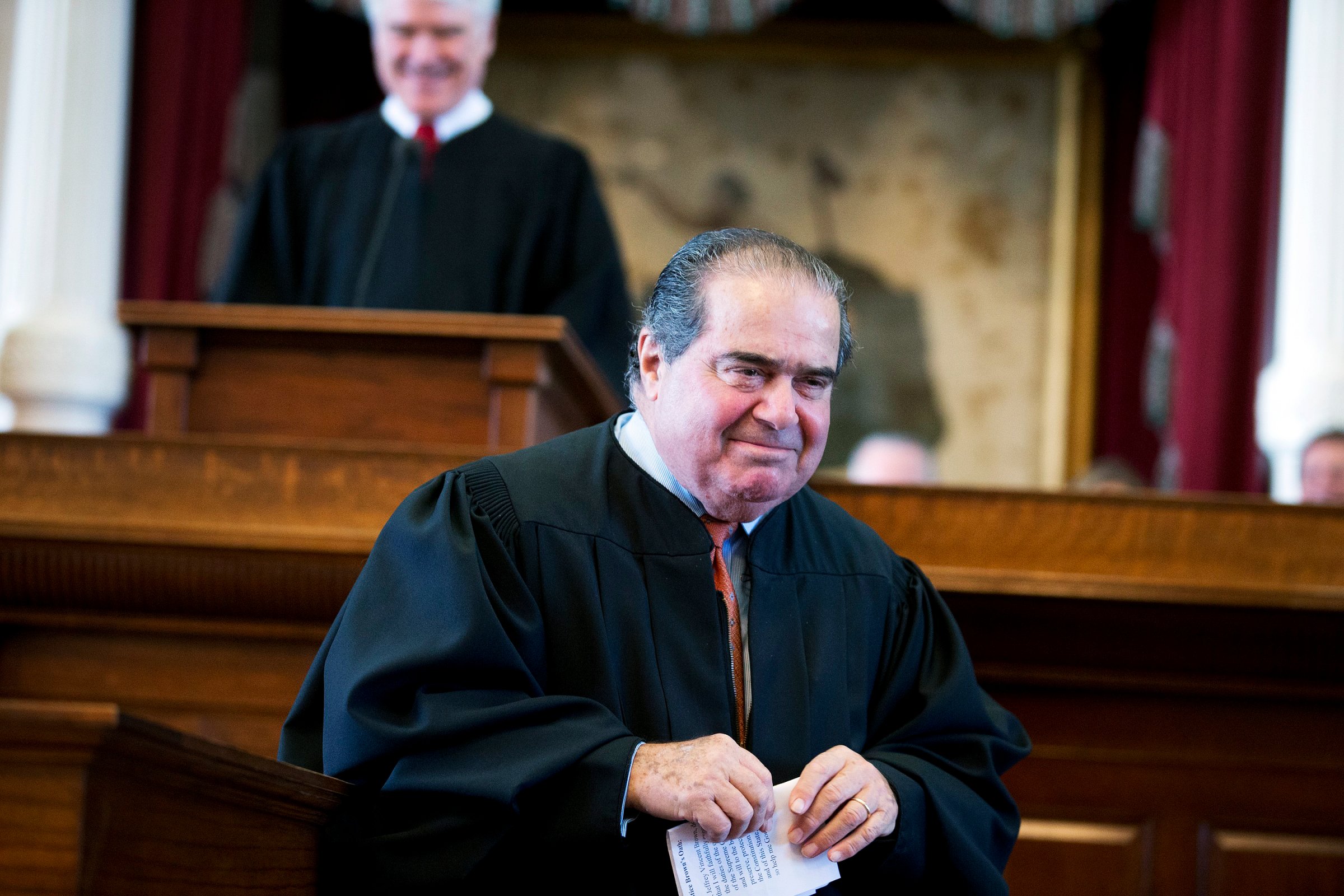 This Nov. 12, 2013 photo shows Supreme Court Justice Antonin Scalia during the investiture of Texas Supreme Court Chief Justice Nathan Hecht at the Texas Capitol in Austin.