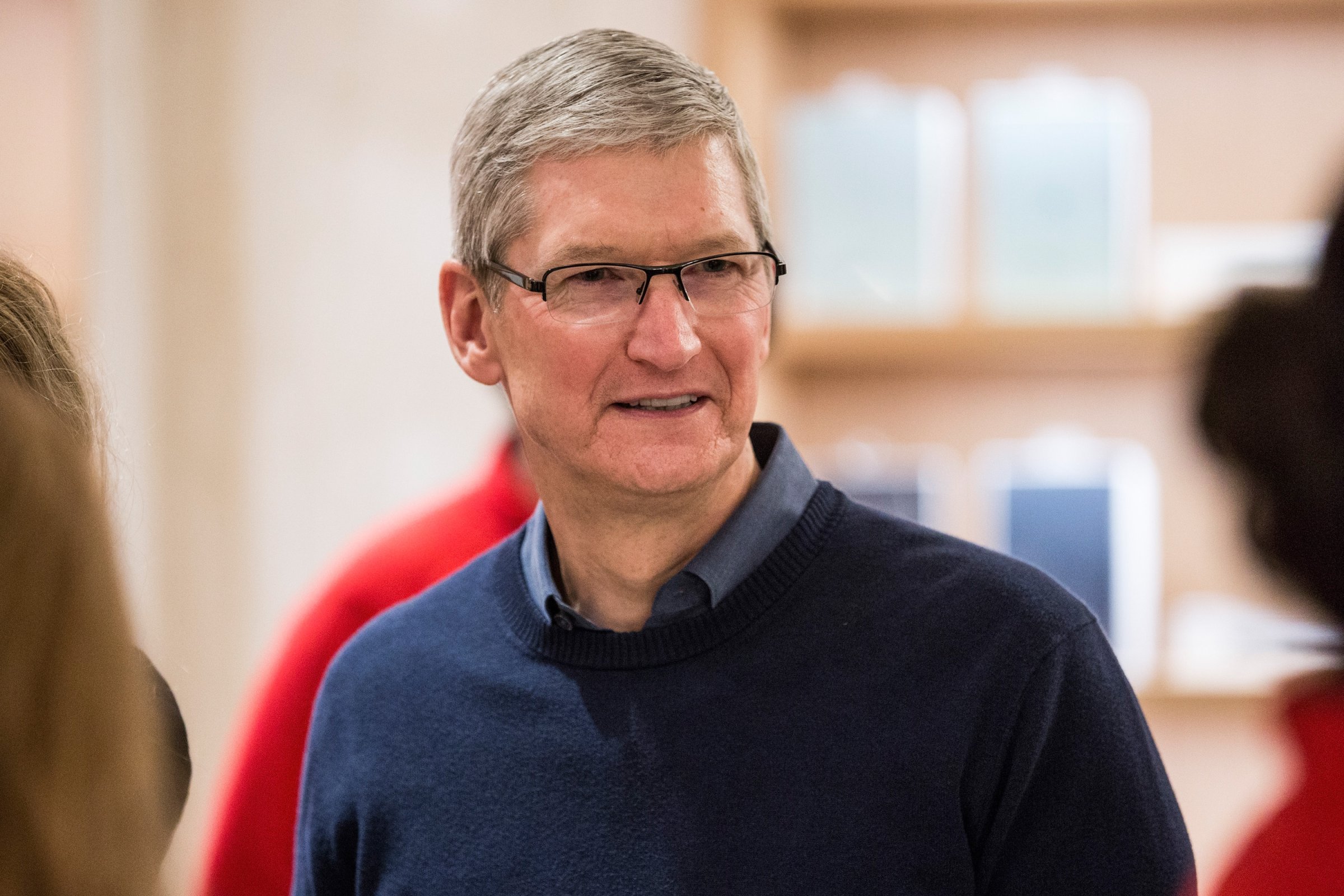 Tim Cook, CEO of Apple, visits an Apple store where third grade children from PS 57 James Weldon Johnson Leadership Academy are learning how to code through Apple's "Hour of Code" workshop program on December 9, 2015 in New York City.