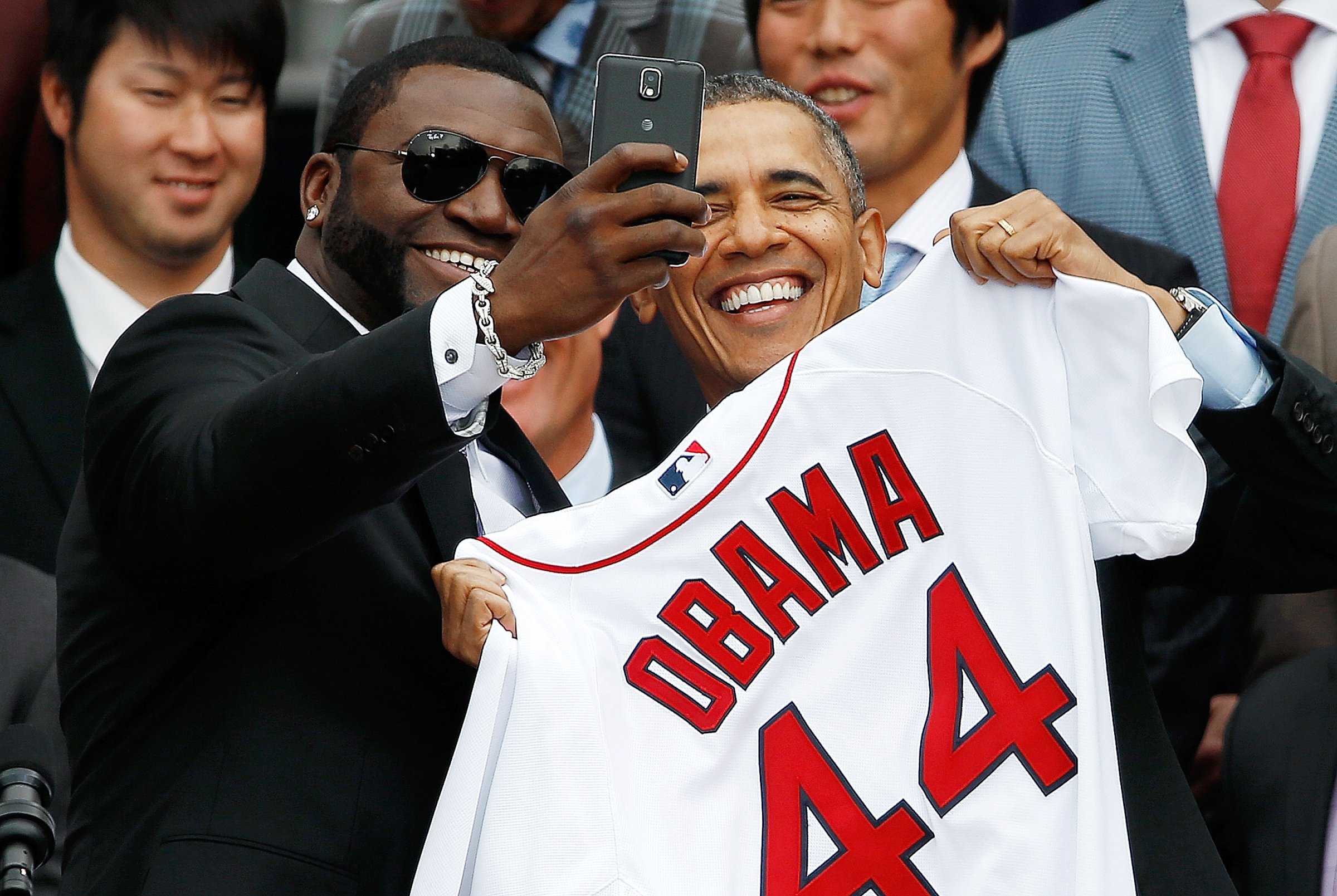 WASHINGTON, DC - APRIL 01: Boston Red Sox designated hitter David Ortiz (L) poses for a "selfie" with U.S. President Barack Obama during a ceremony on the South Lawn of the White House to honor the 2013 World Series Champion Boston Red Sox April 1, 2014 in Washington, DC. The Red Sox defeated the St. Louis Cardinals in the 2013 World Series.(Photo by Win McNamee/Getty Images)
